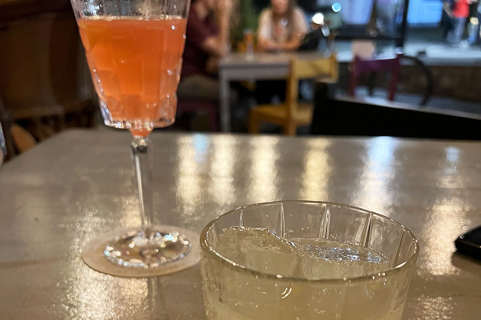 two cocktails on a table
