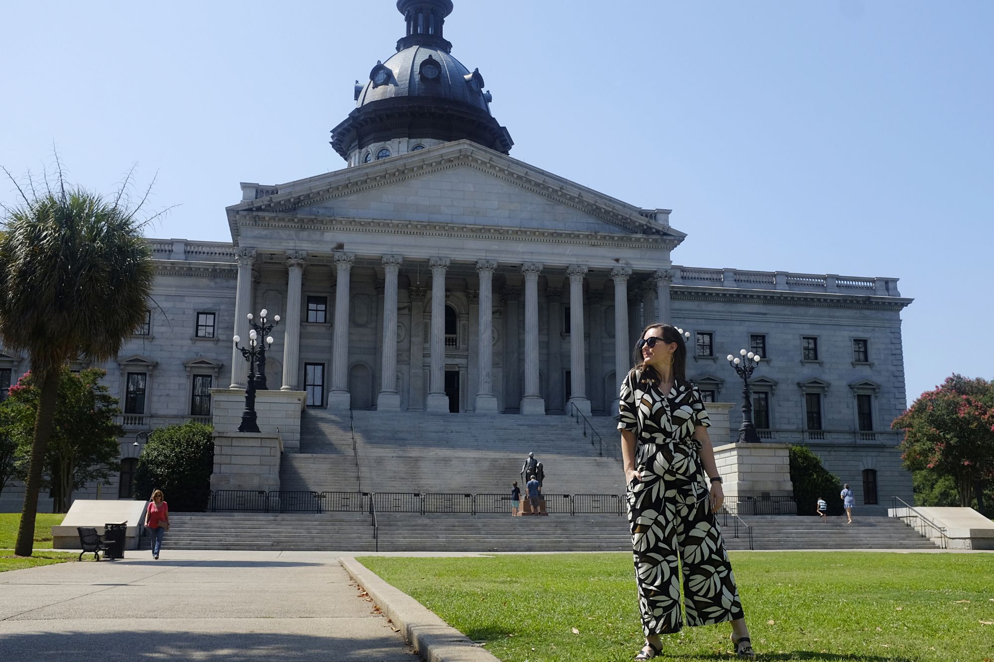Alyssa stands in front of the State House
