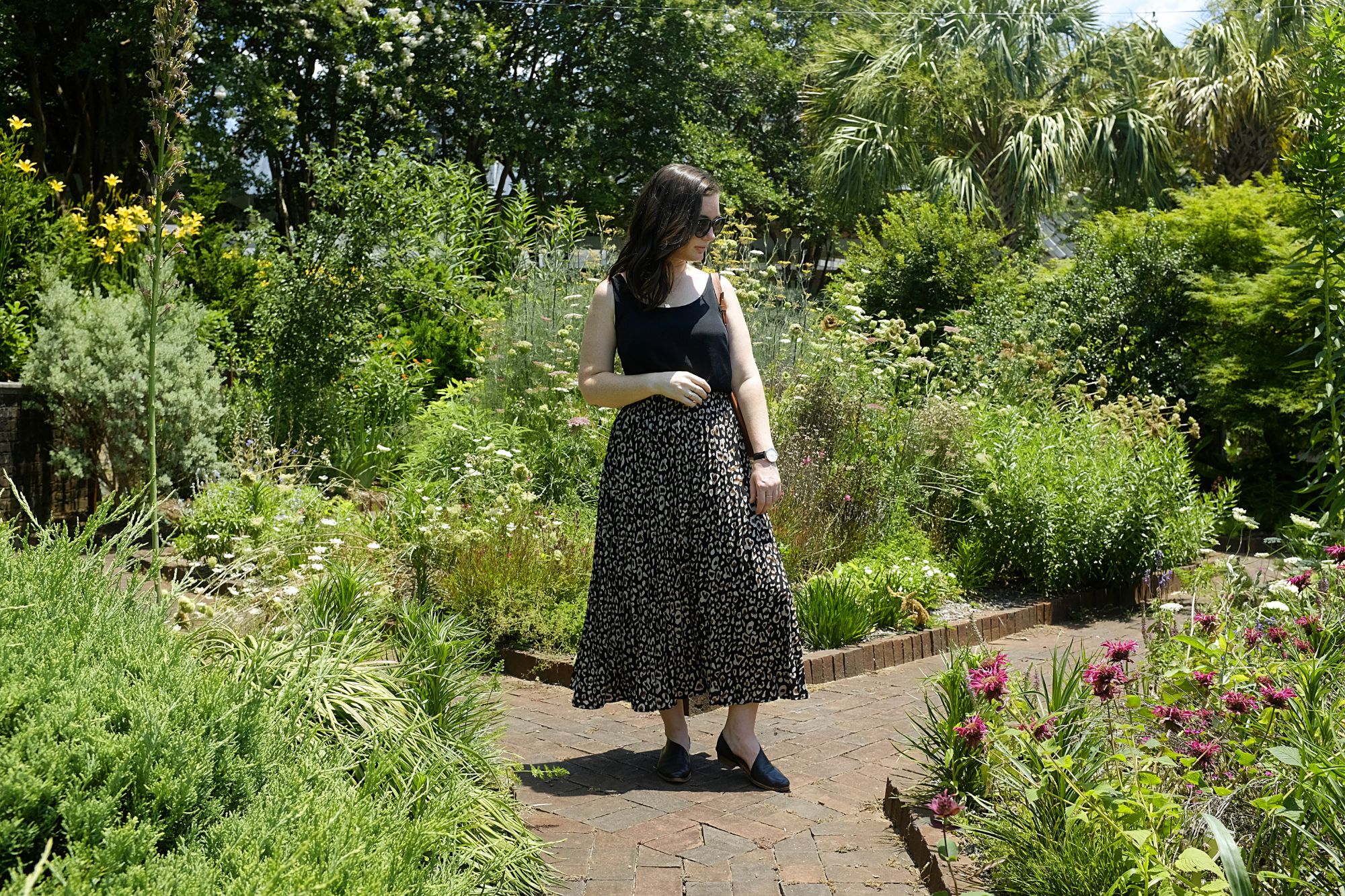 Alyssa stands in the gardens at the Riverbanks Zoo