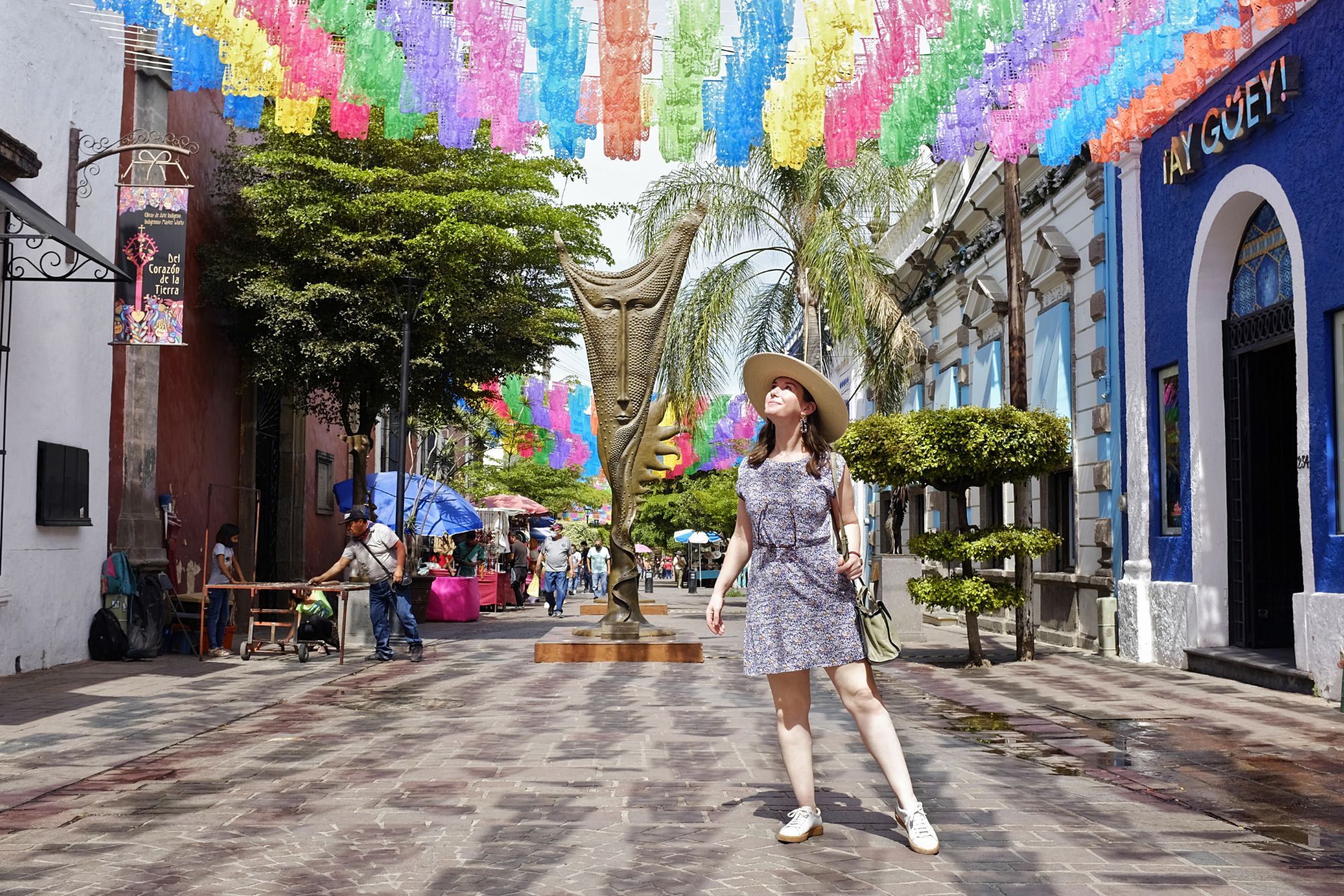 Alyssa stands in a street in Tlaquepaque