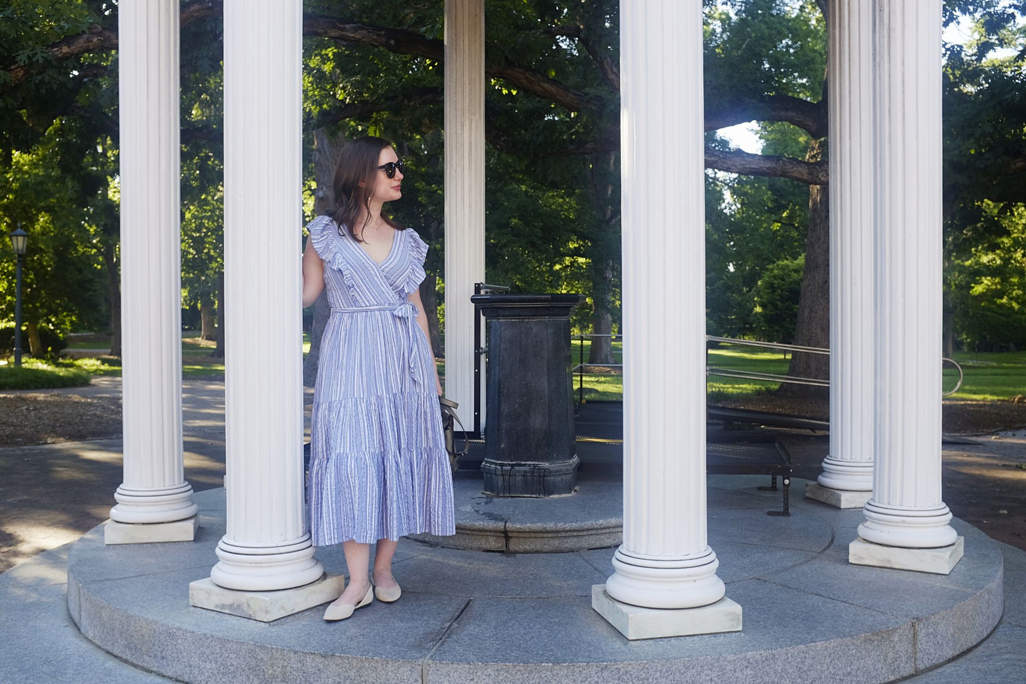 Alyssa stands by the Old Well on the UNC Chapel Hill campus