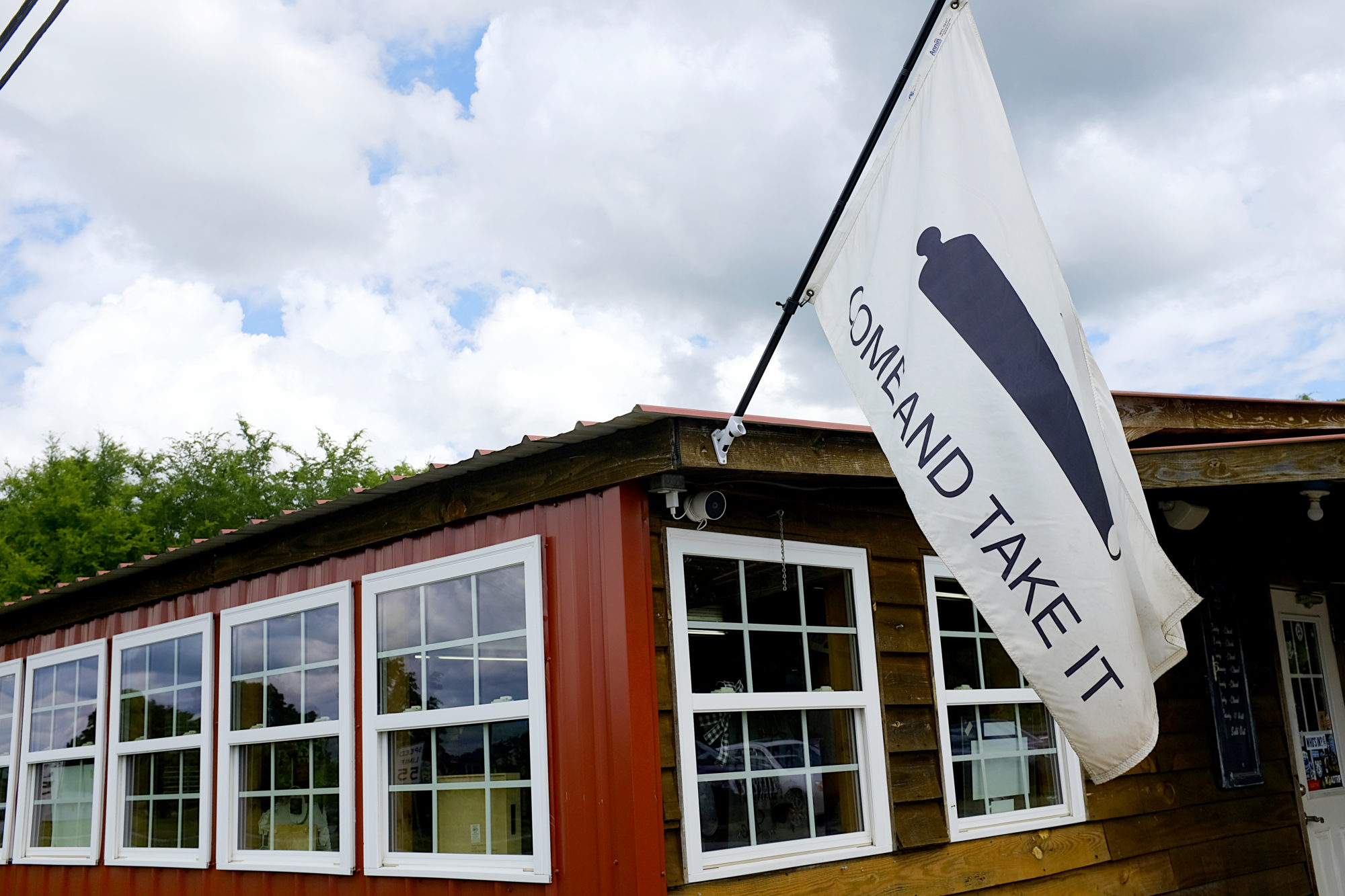 "Come and take it" flag on the outside of the building