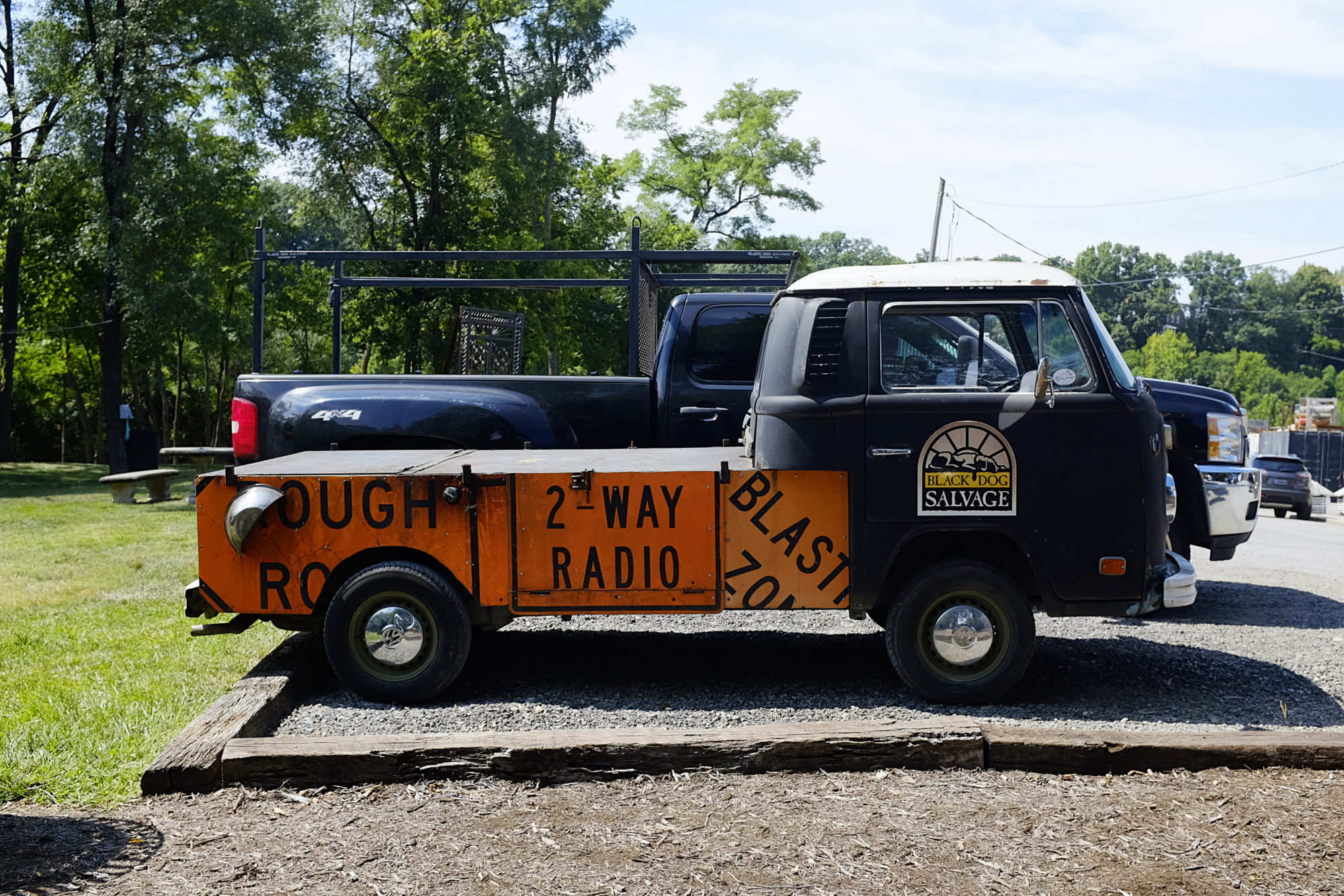 A vintage truck with the Black Dog Salvage logo