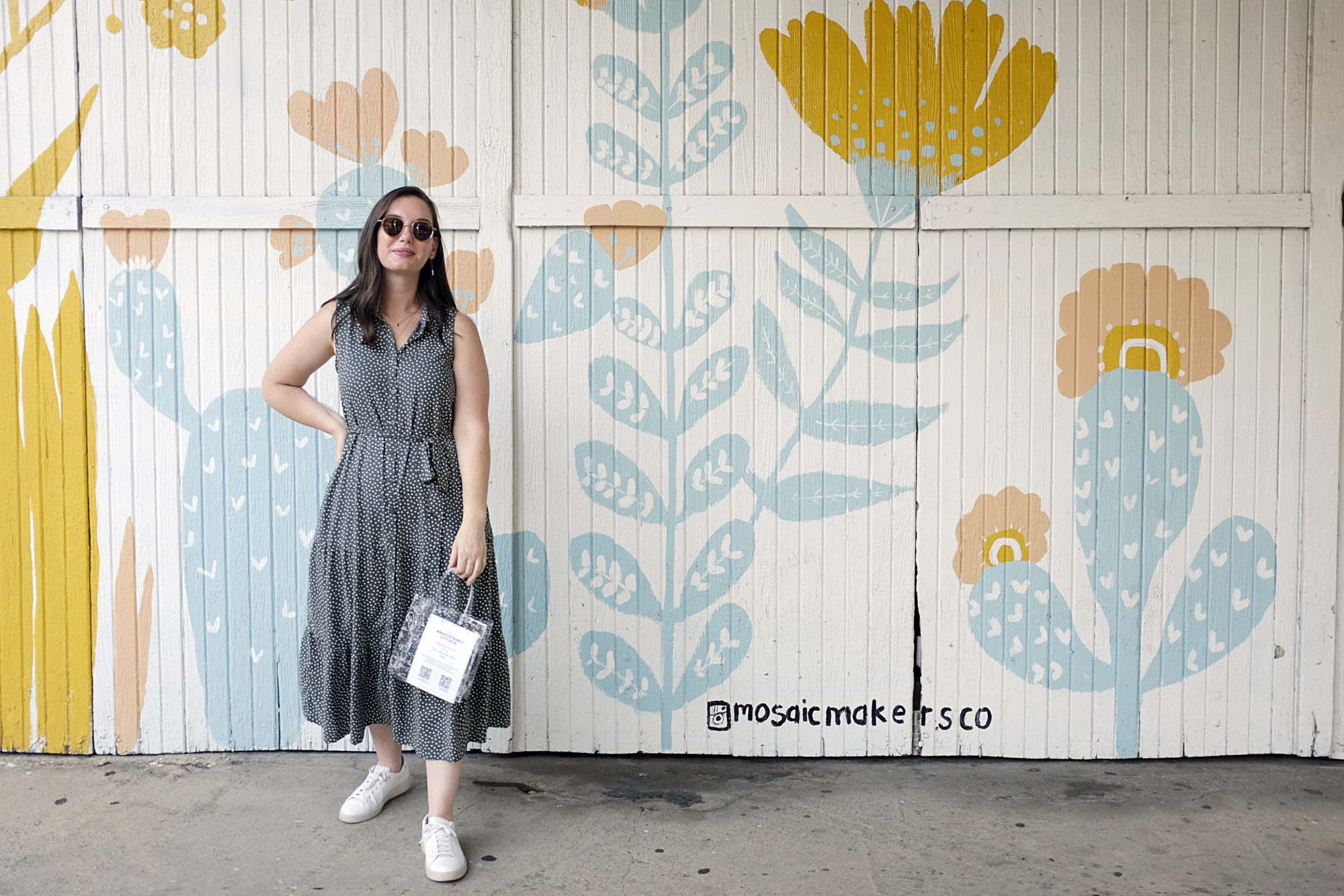 Alyssa wears a green polka dot dress in Dallas