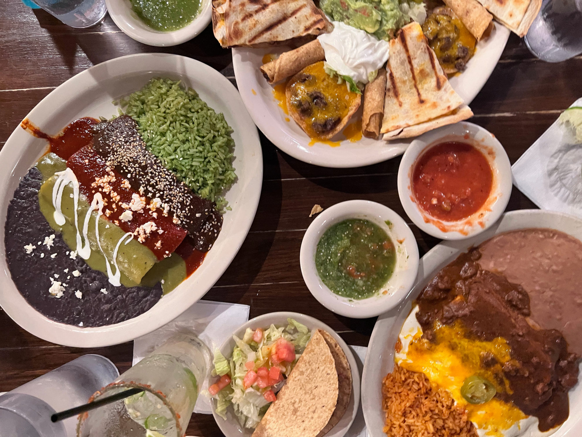 Plates full of Tex-Mex on a restaurant table