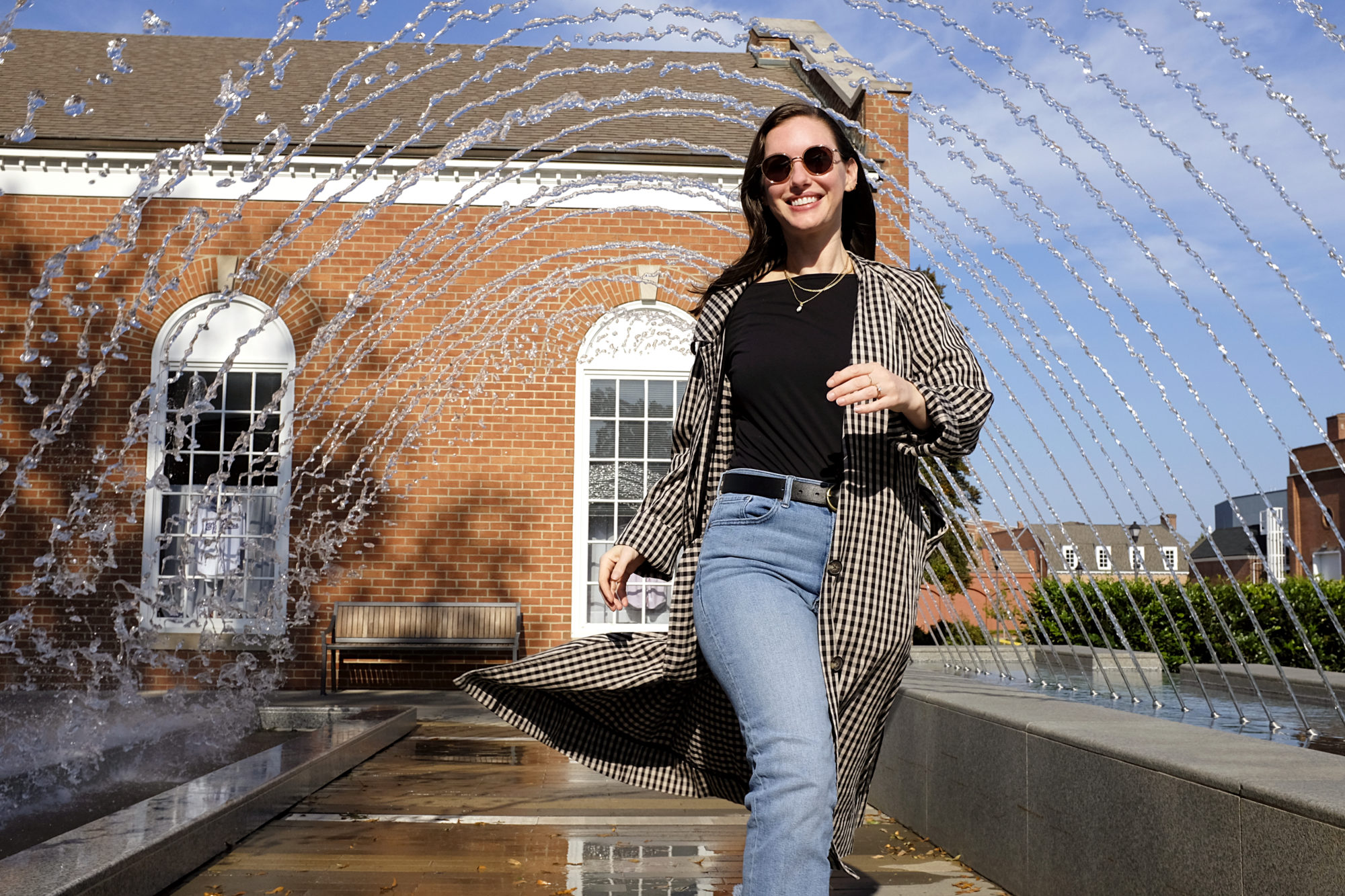 Alyssa runs through the fountain on West Avenue