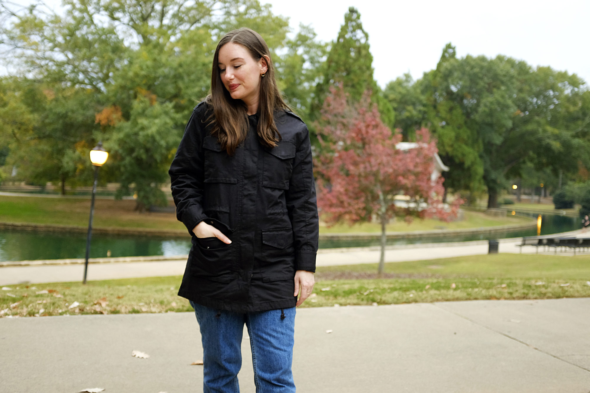 Alyssa wears the Pact Lined Woven Safari Jacket zipped and fastened