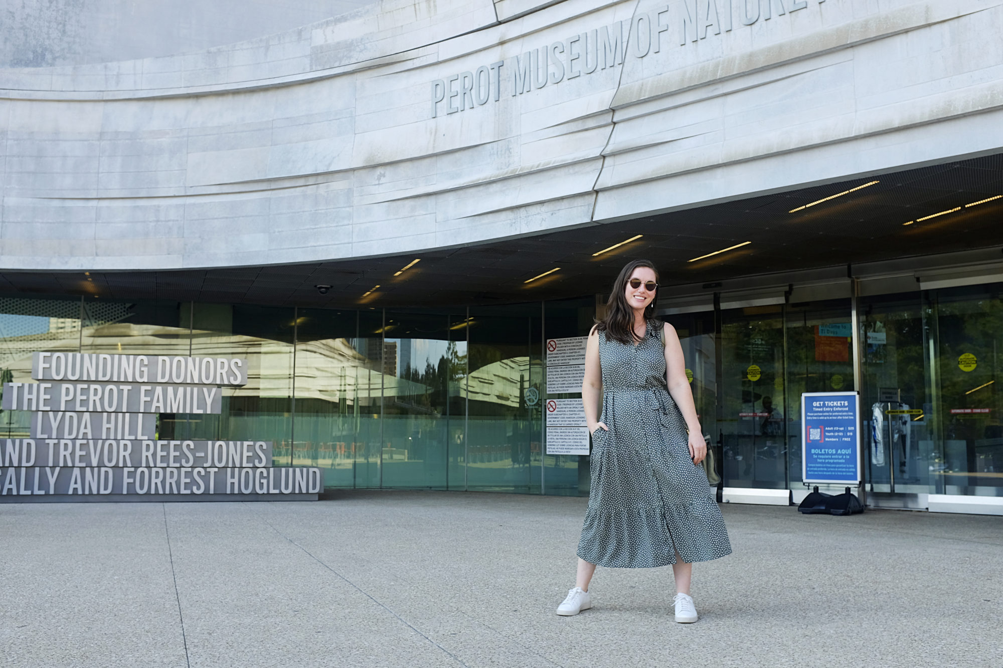 Alyssa stands outside of the Perot Museum