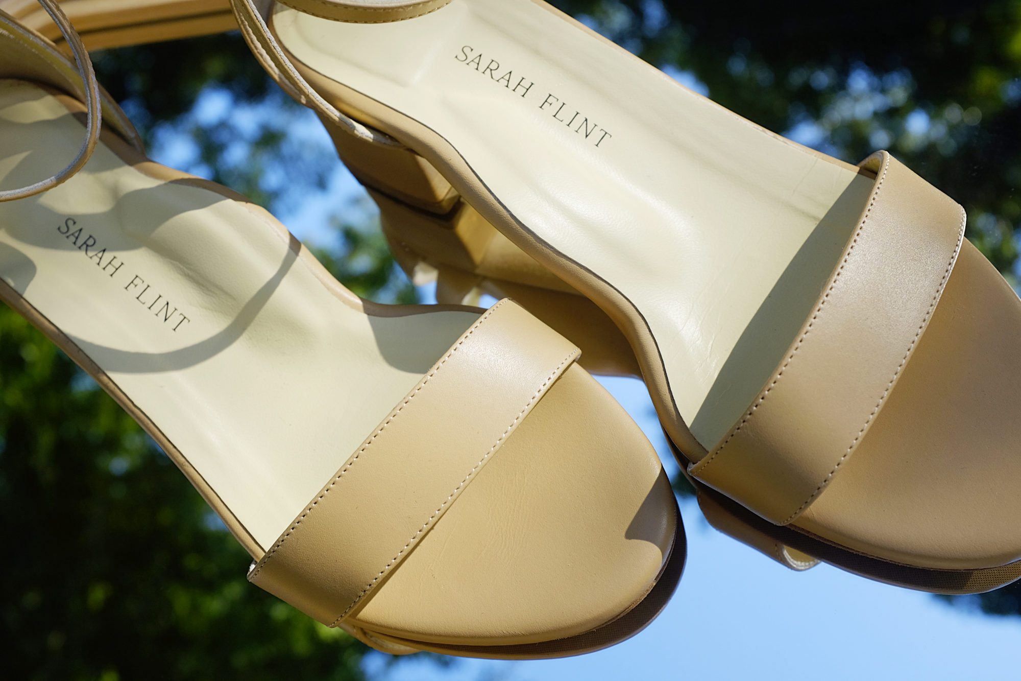 The Perfect Block Sandals from Sarah Flint sit on a mirror