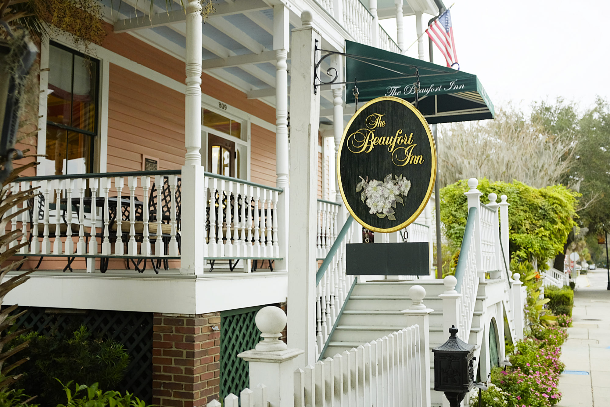 View of the porch and sign at The Beaufort Inn