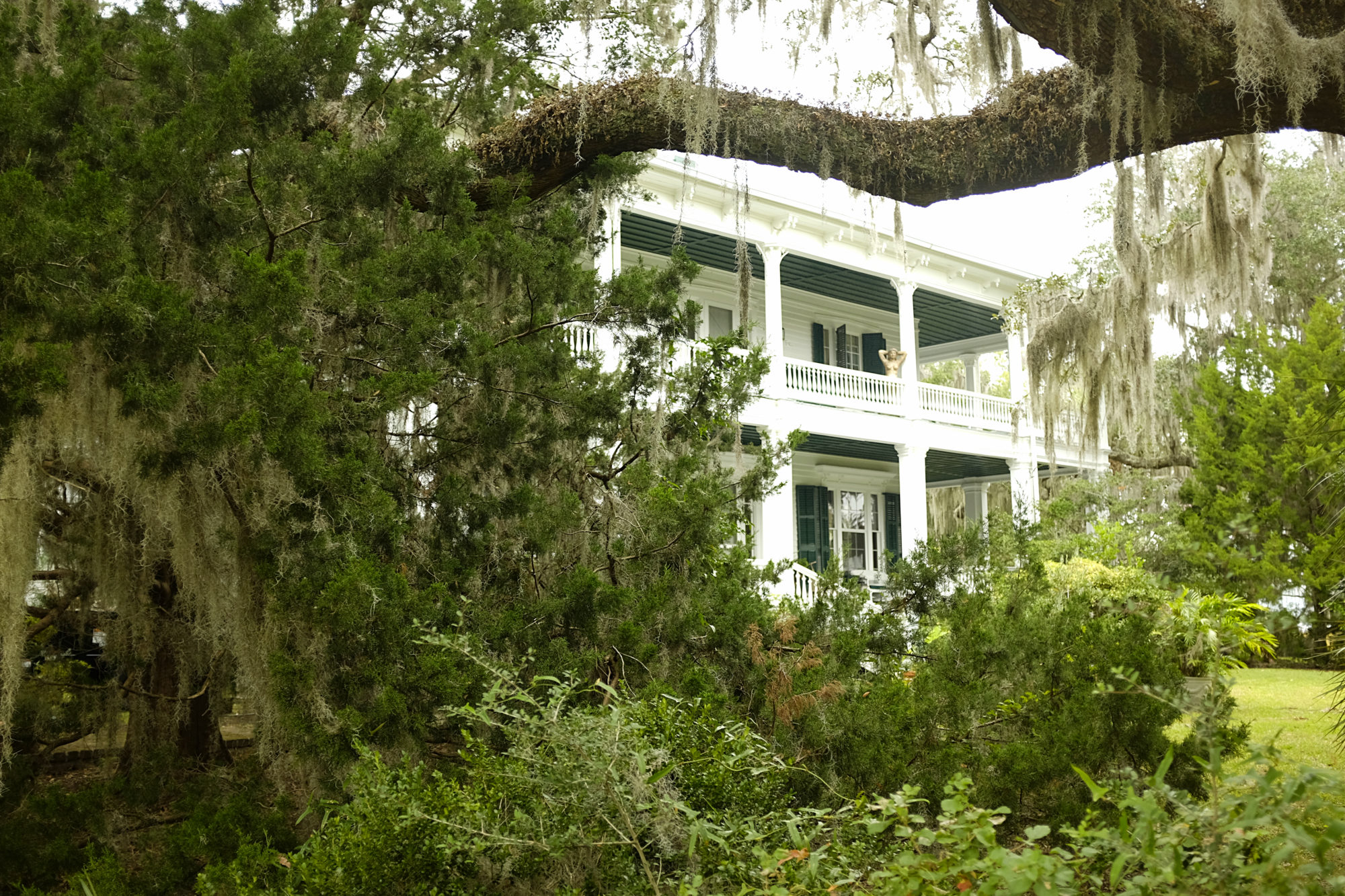 A historic home in Beaufort with a mermaid statue