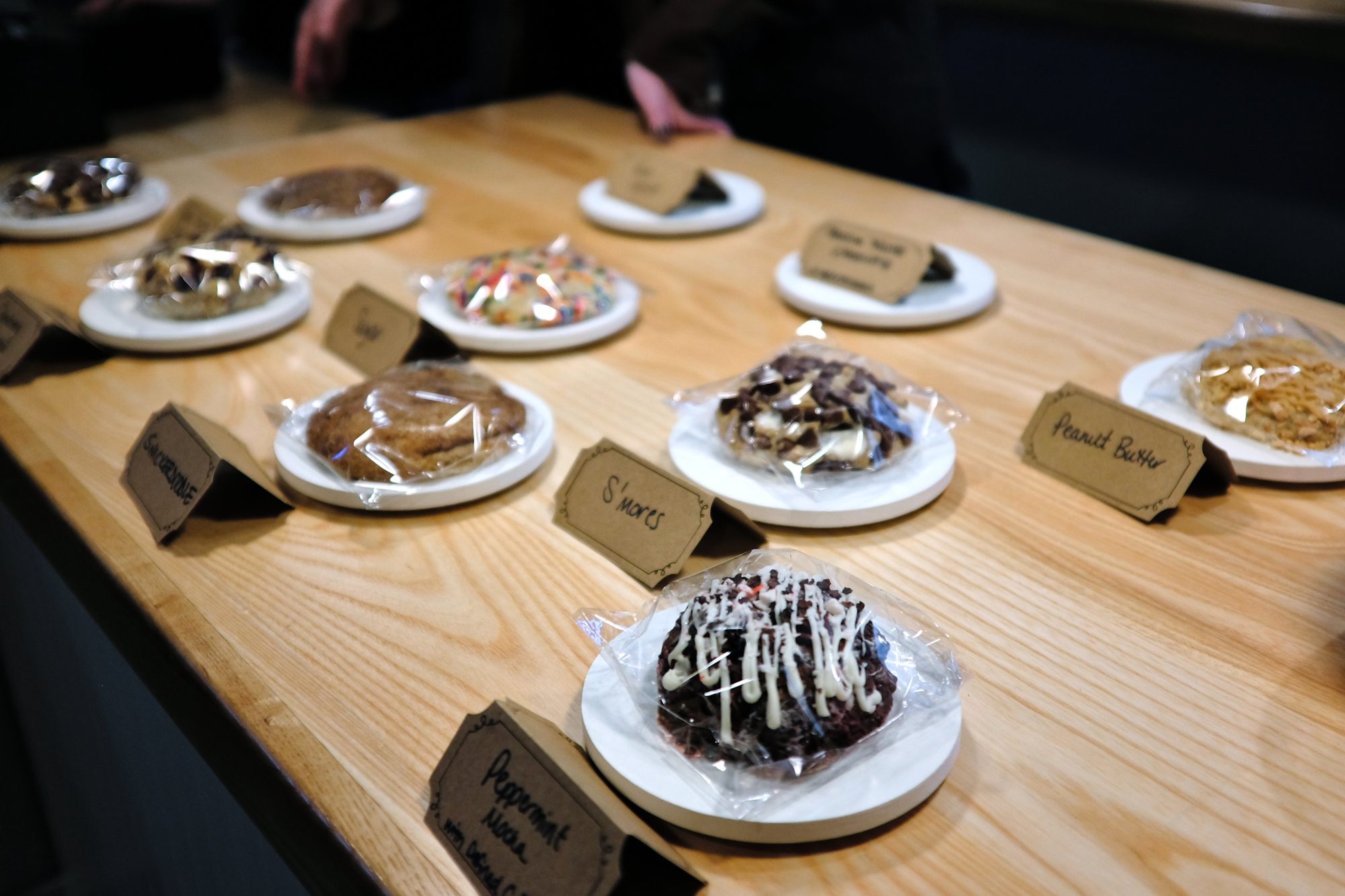 An assortment of large cookies on a counter