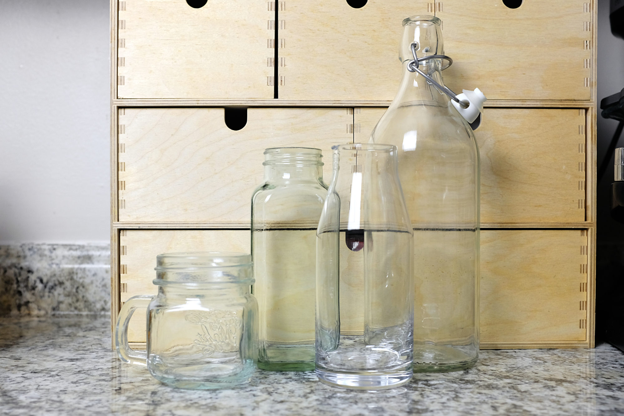 Four different glass bottles