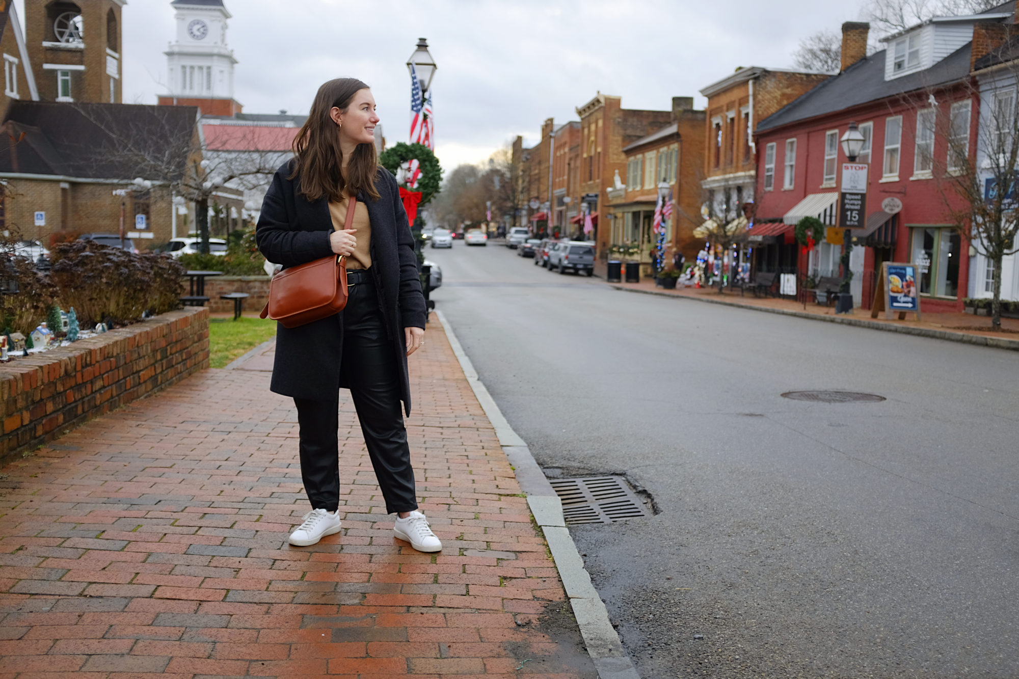 Alyssa stands on the street in Jonesborough