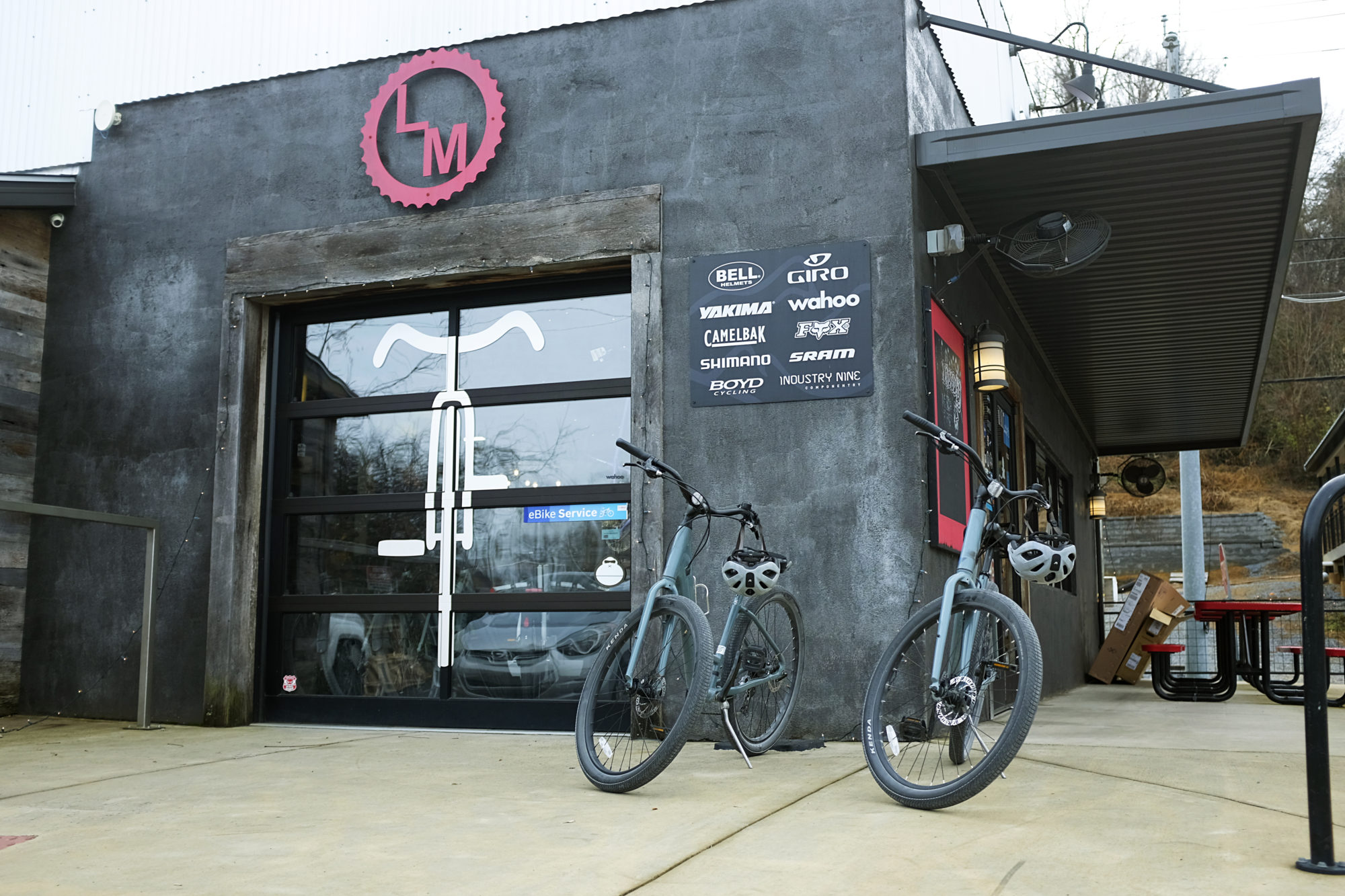 Two bikes sit out front of Local Motion in Johnson City