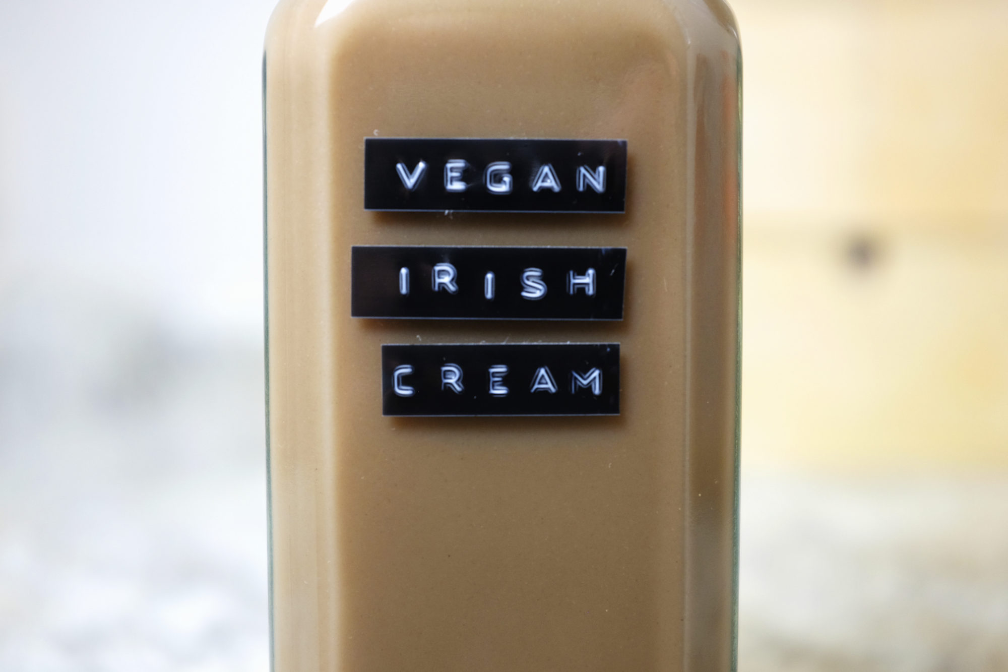 Glass jar that reads Vegan Irish Cream