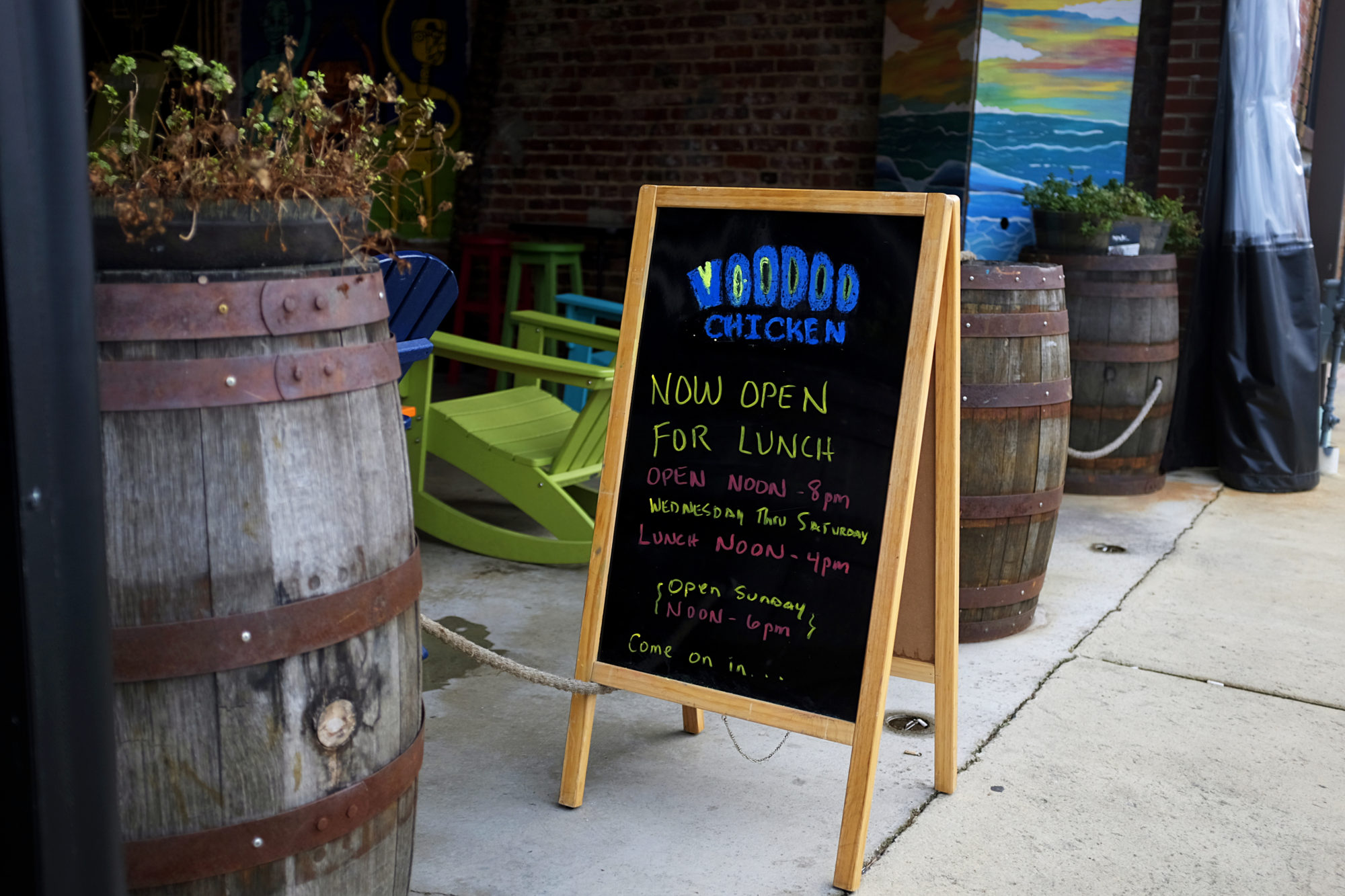 Sandwich board sign advertising Voodoo Chicken