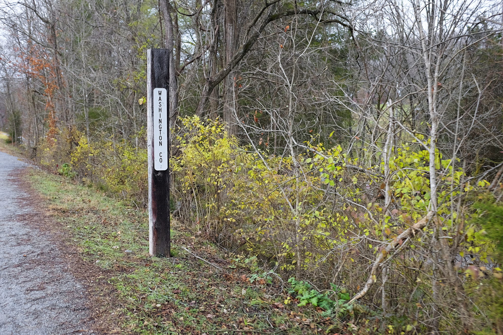 The Washington County line marker on the Tweetsie Trail