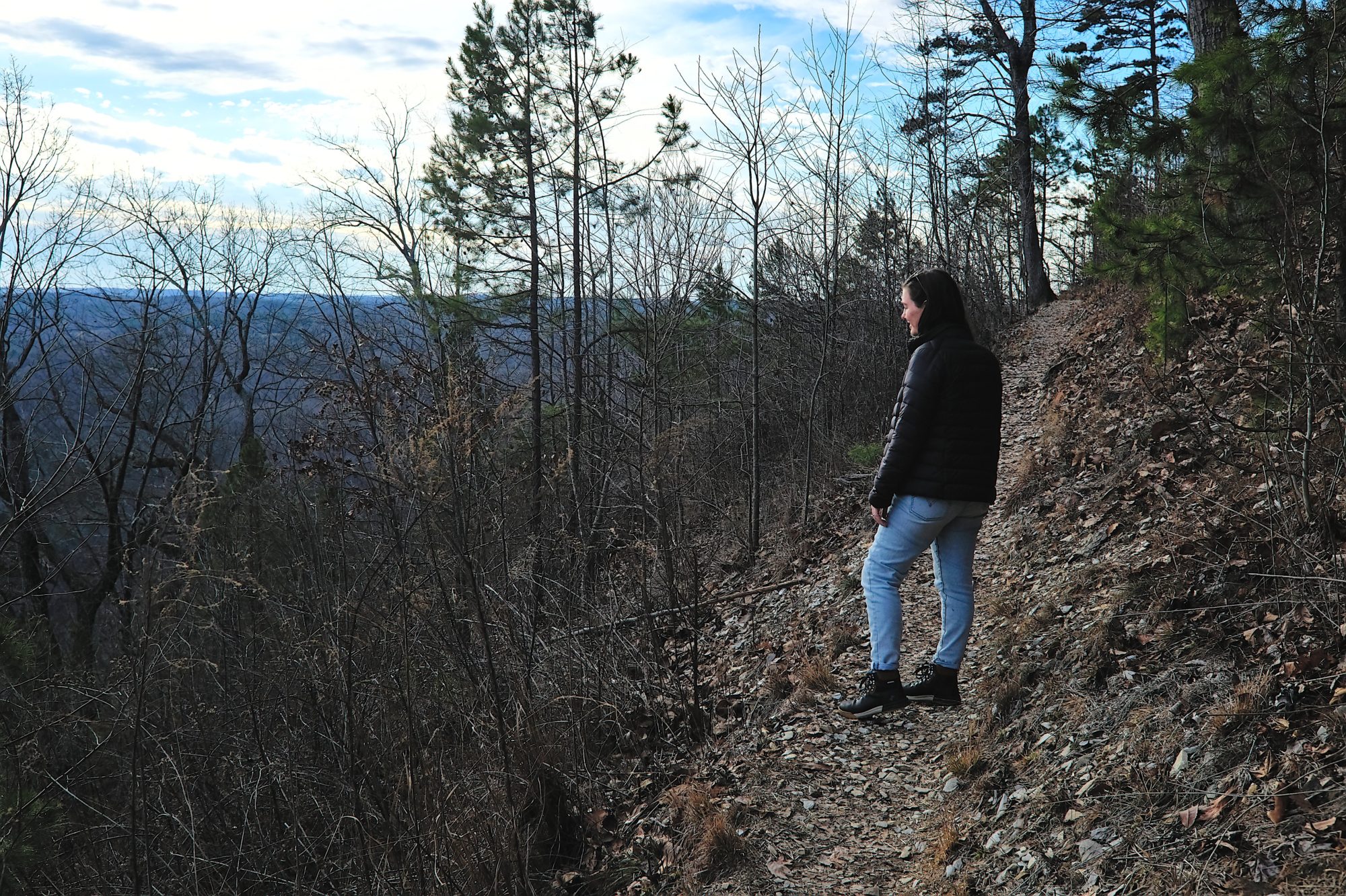 Alyssa walks on the trail at Morrow Mountain State Park