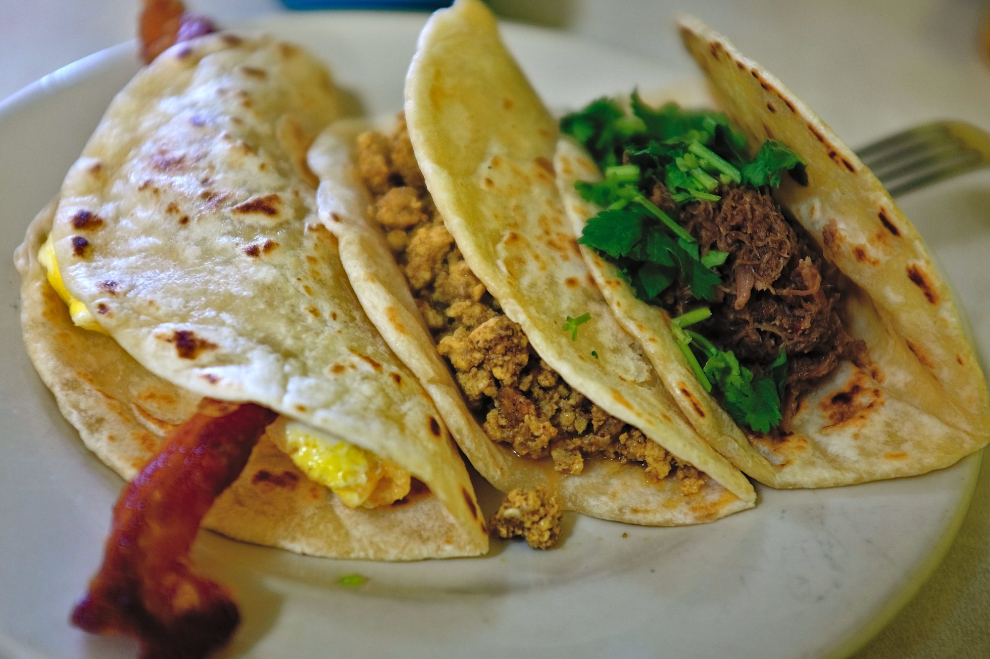 A trio of breakfast tacos from Joe's Bakery & Coffee Shop