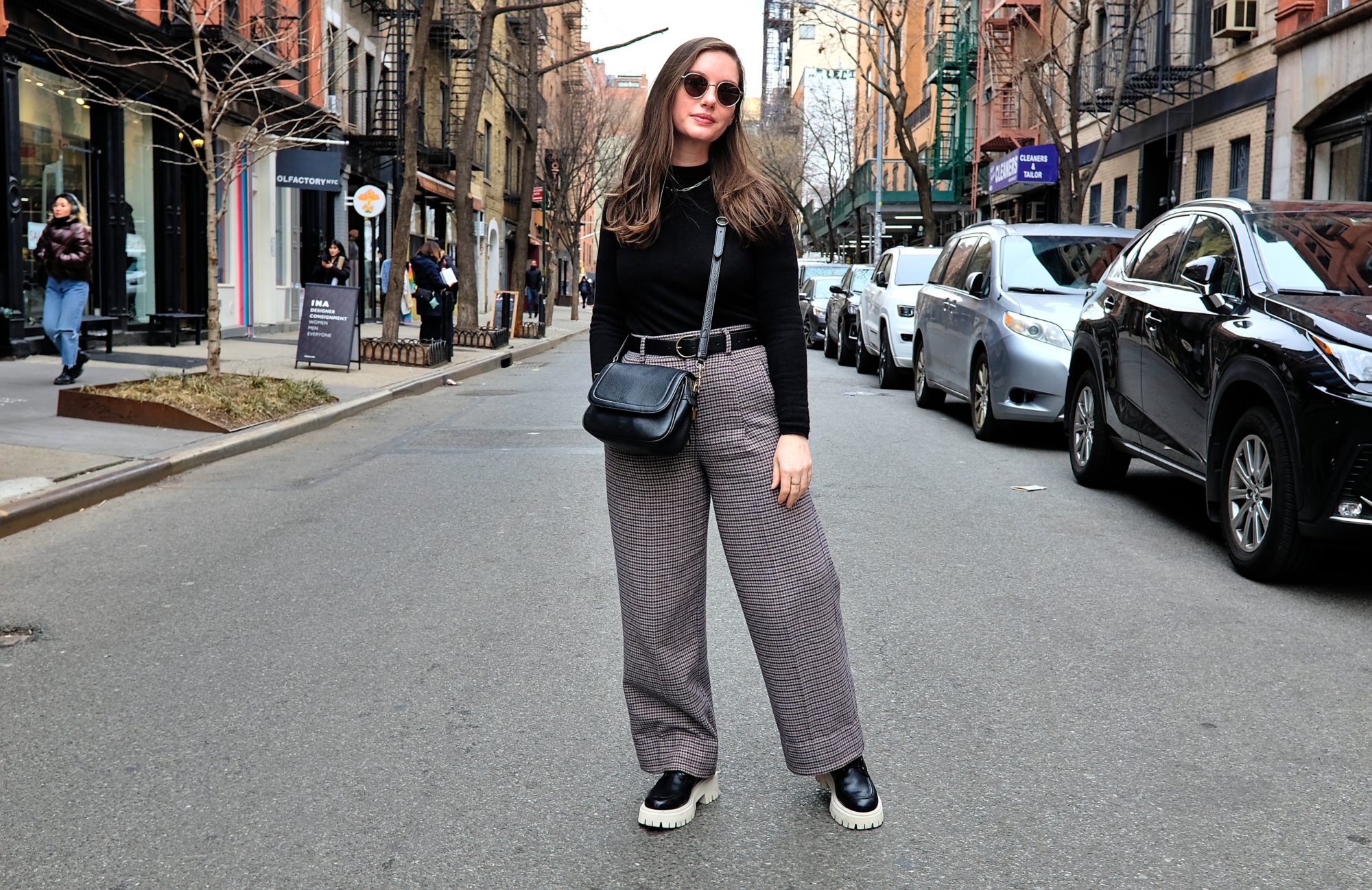 Alyssa stands in a barricaded street in NYC