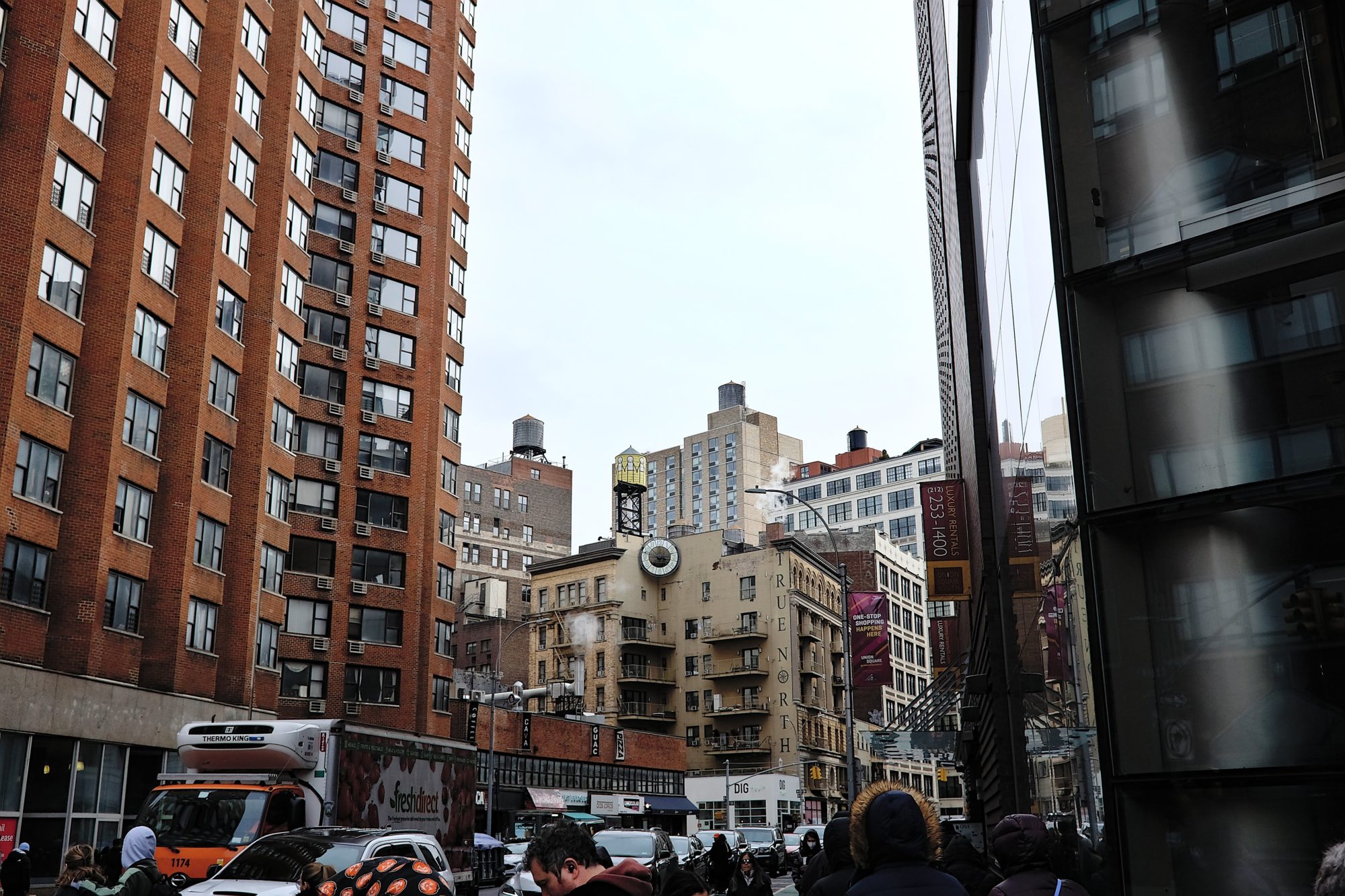 a crowded city street in Manhattan