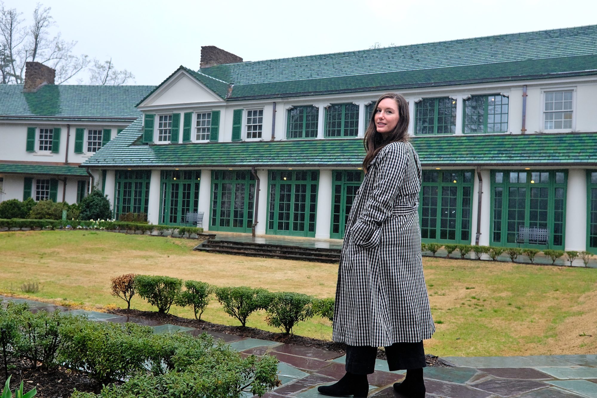 Alyssa stands in front of Reynolda House