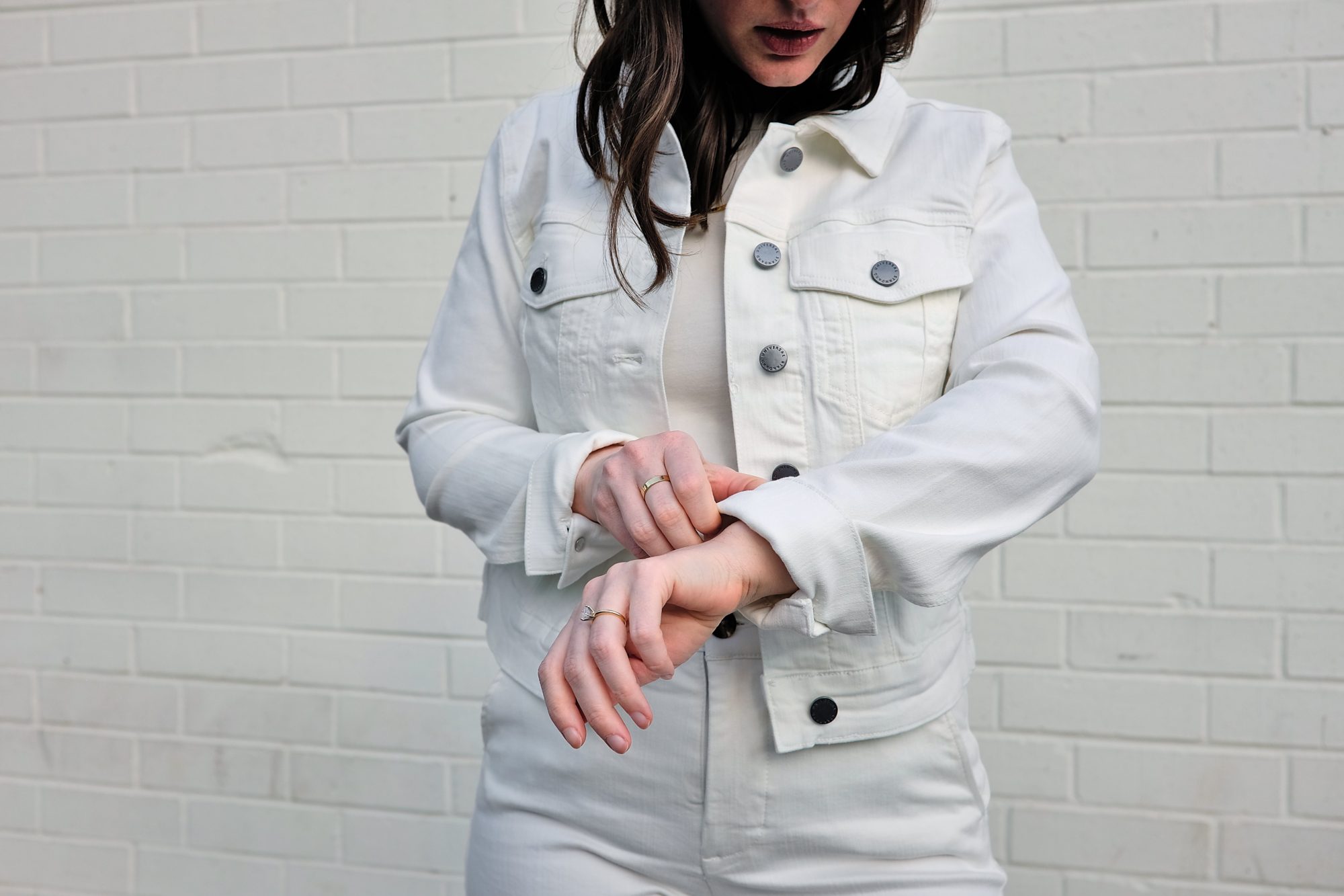 Alyssa cuffs the sleeves of the Kelsey Denim Jacket from Universal Standard