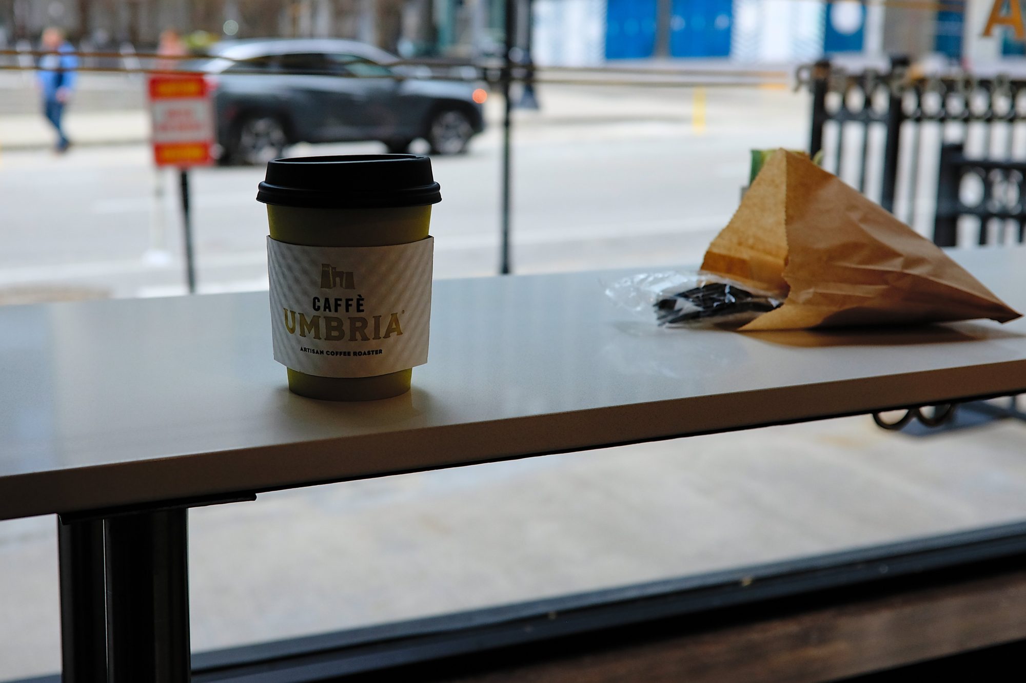 A coffee in the window at Caffe Umbria