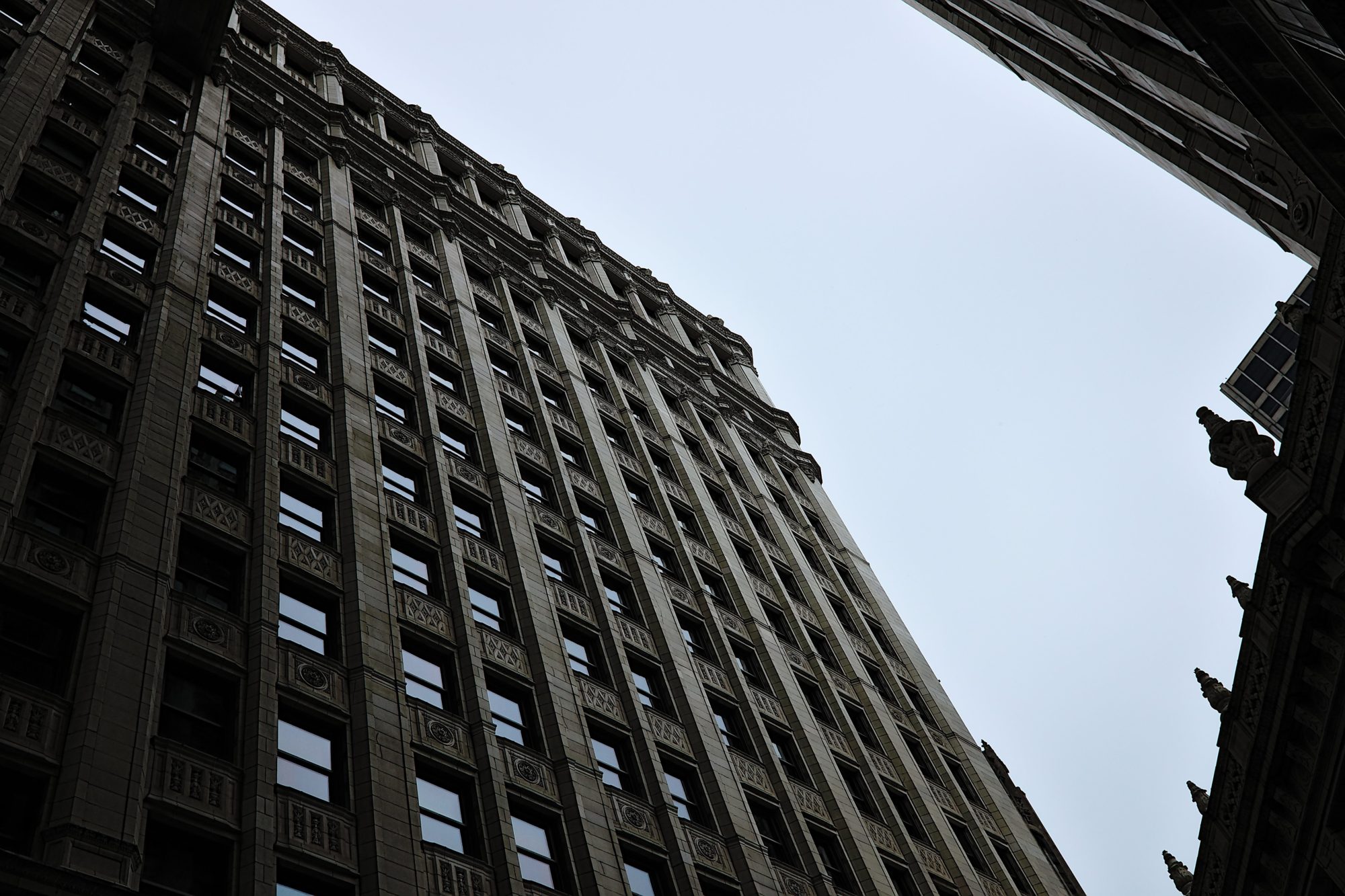 A view of a building in Chicago from the ground up