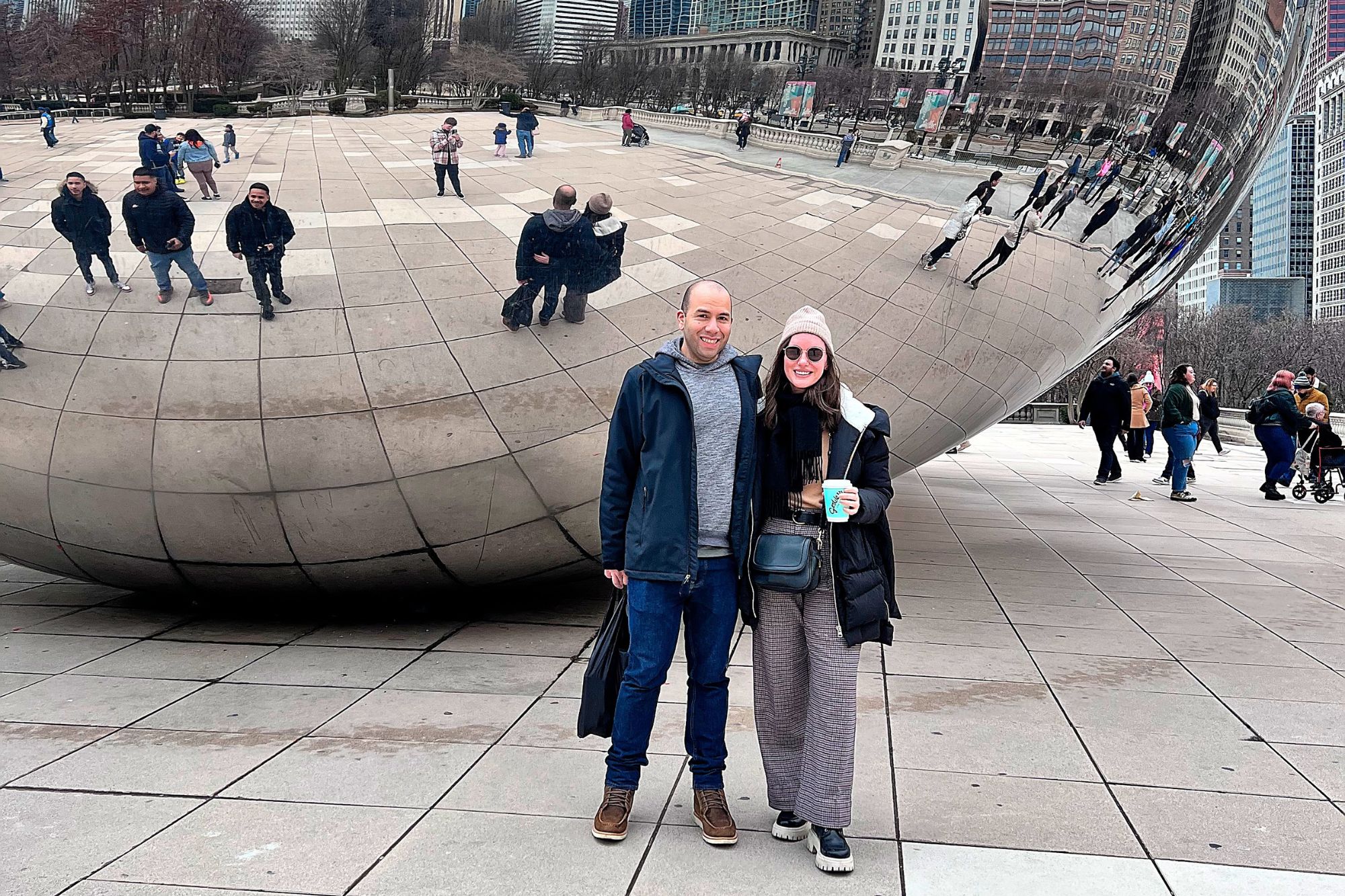 Alyssa and Michael stand in front of The Bean