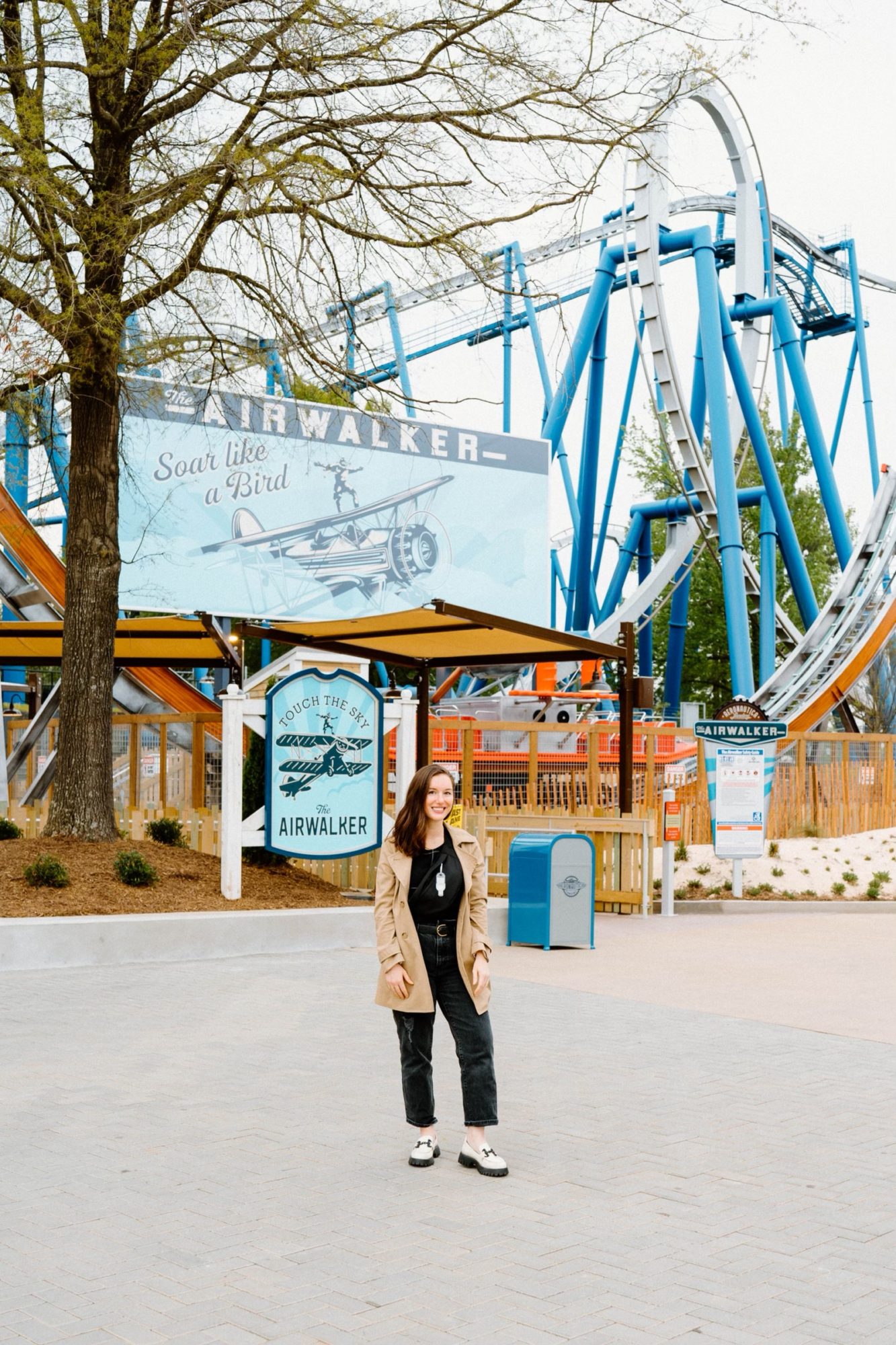 Alyssa stands in front of the Airwalker ride