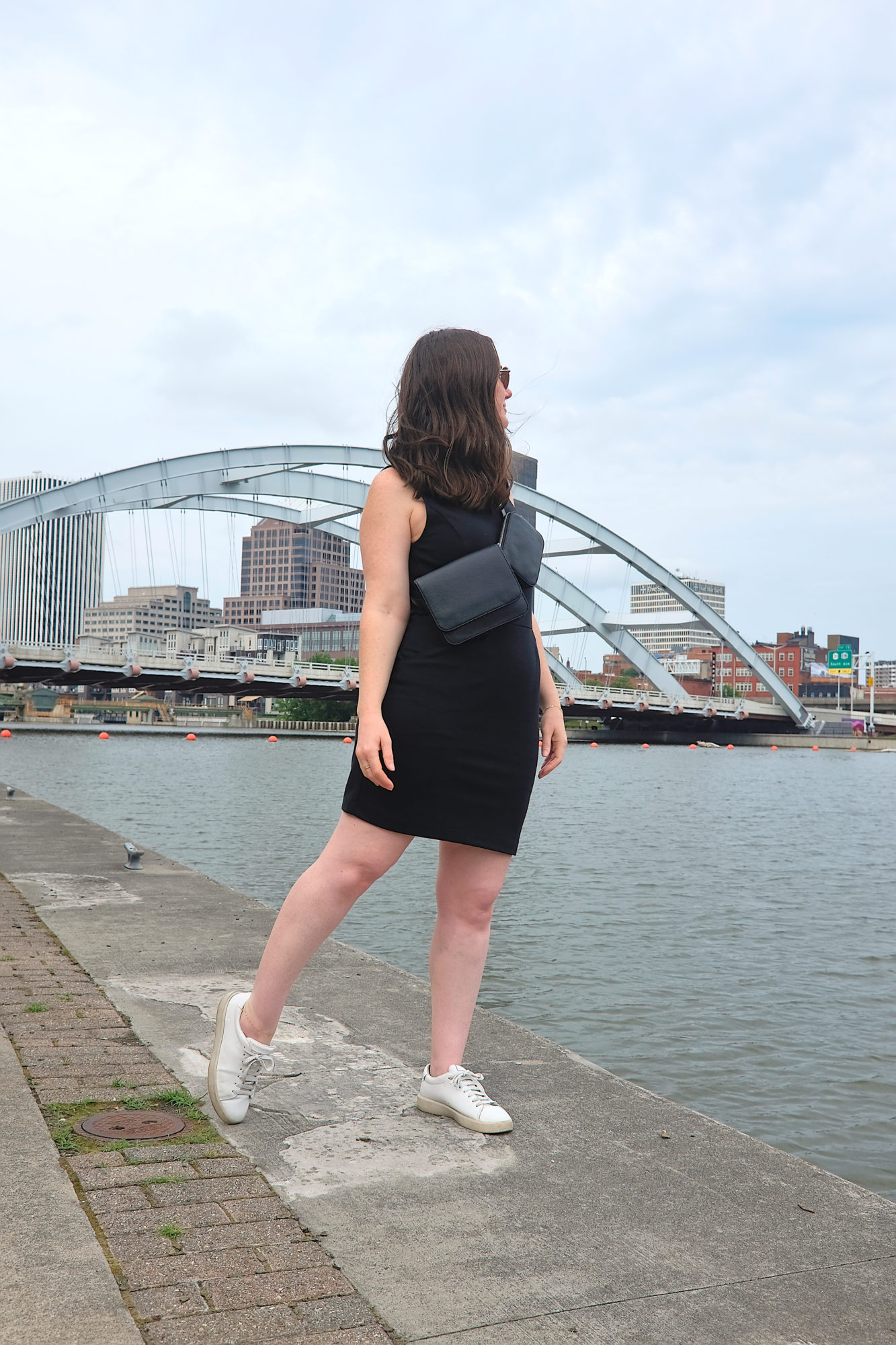 Alyssa in front of the Frederick Douglass–Susan B. Anthony Memorial Bridge in Rochester