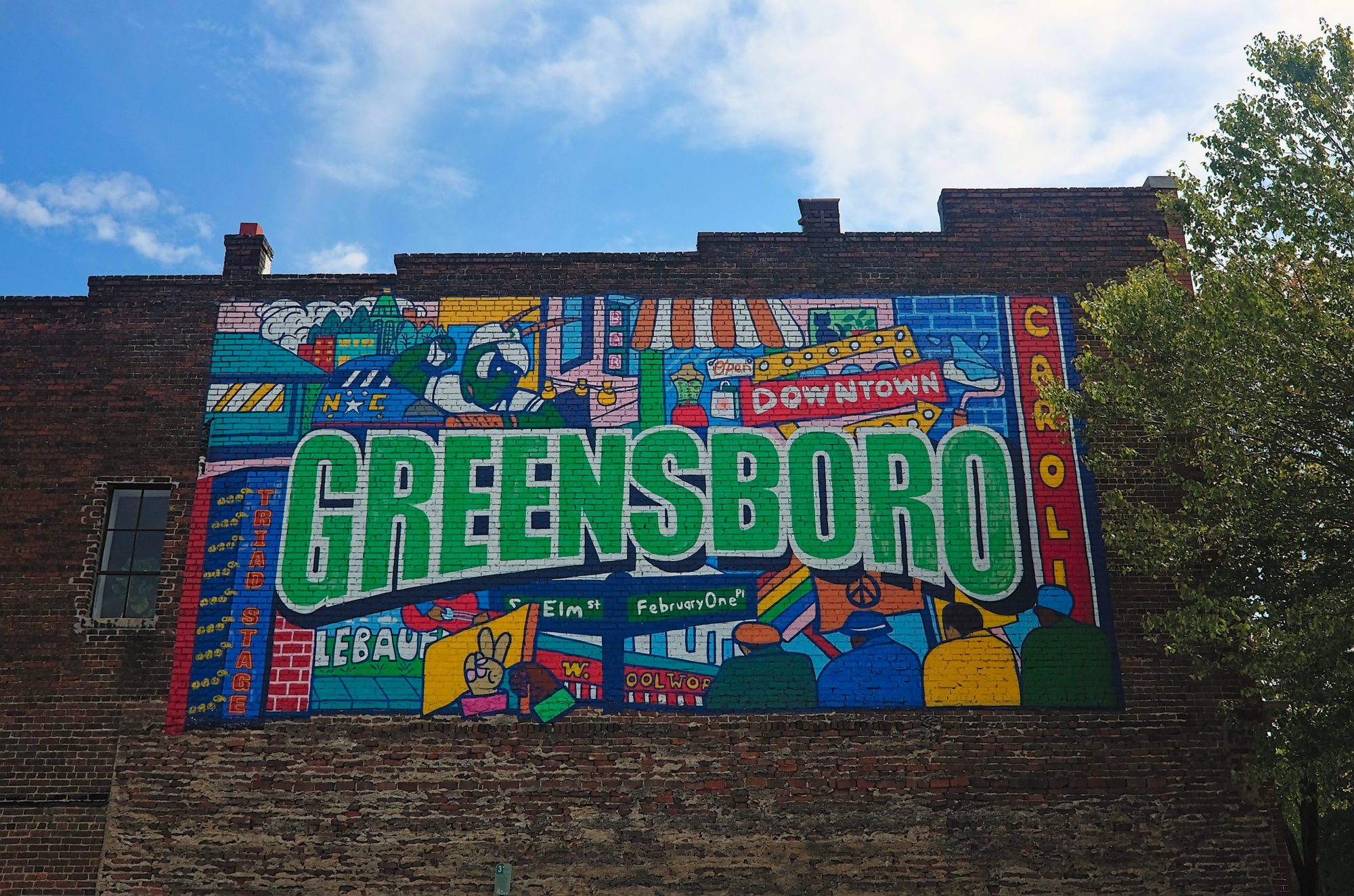 A mural that reads "Downtown Greensboro"