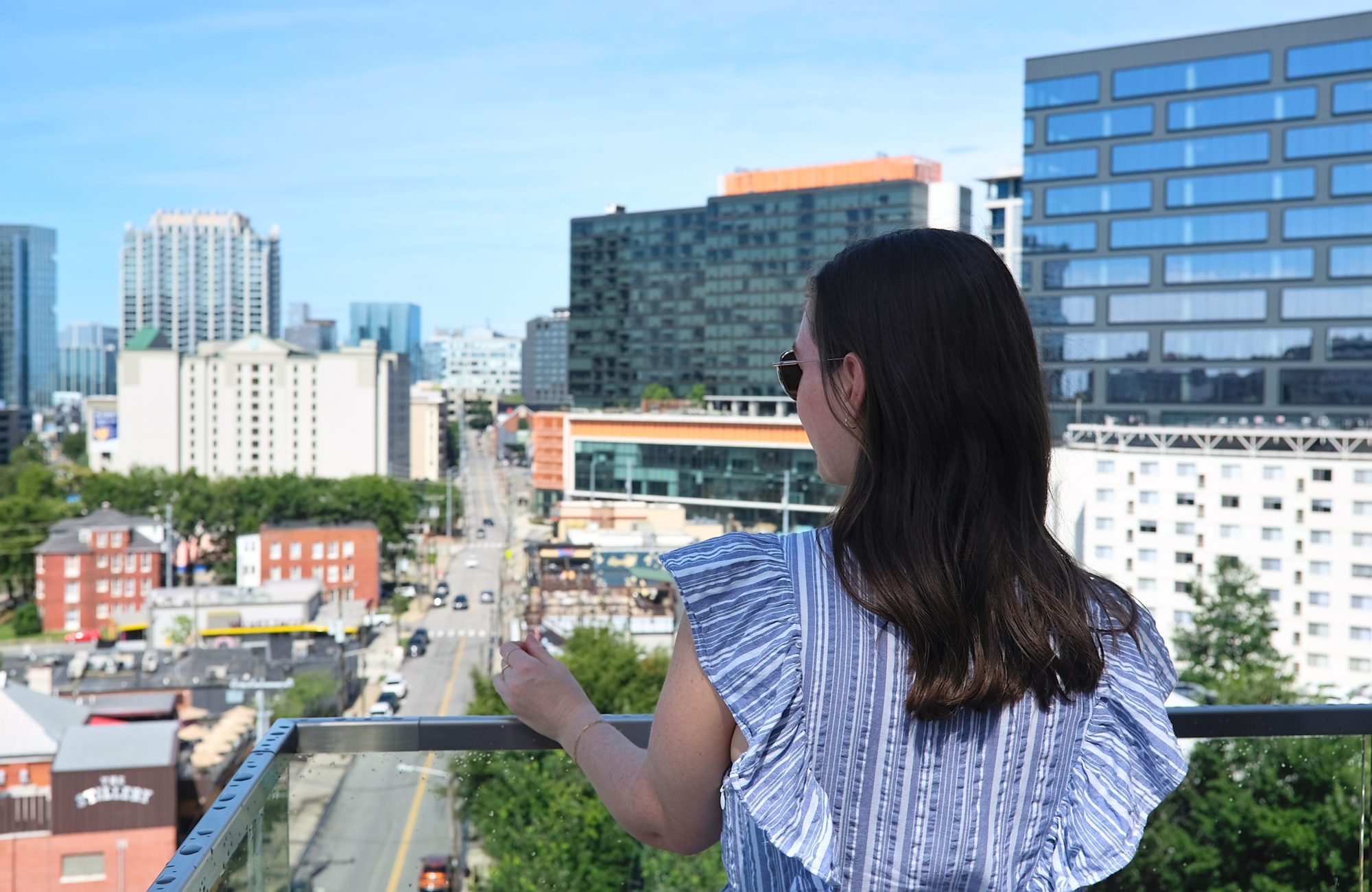 Alyssa peers out over downtown Nashville