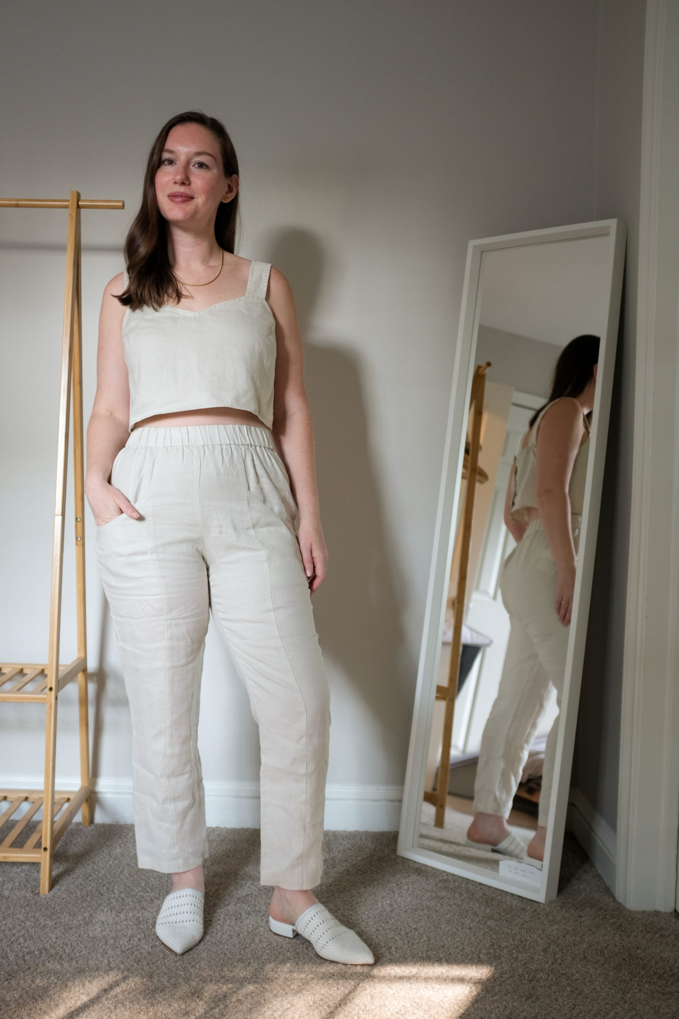 Alyssa wears a set of off-white linen pieces from Quince