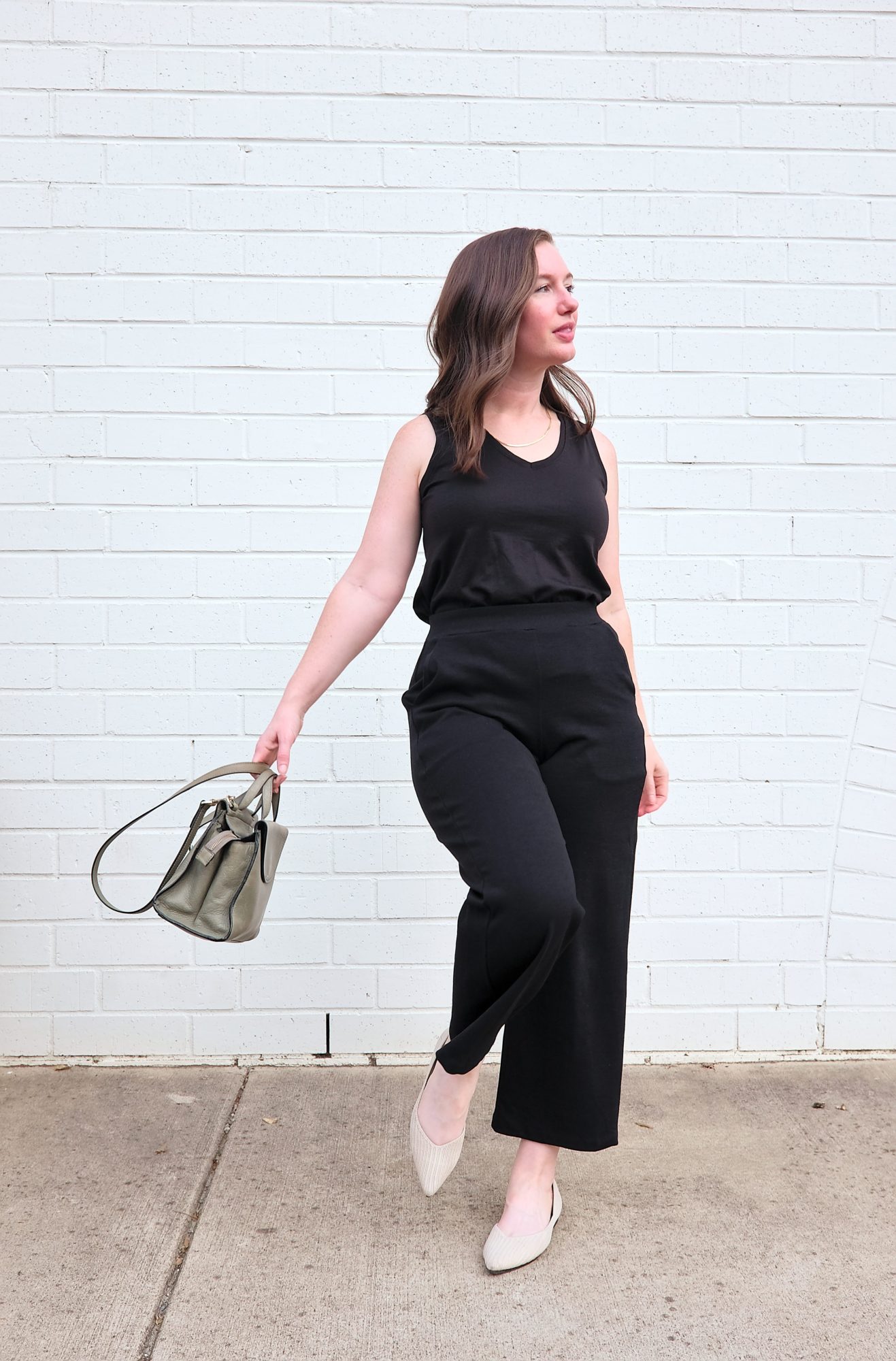 Alyssa wears the Frame Ponte Culotte with the Poppy Tank