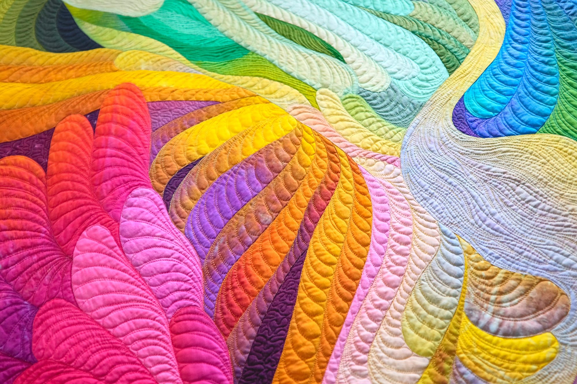 close up of a colorful quilt