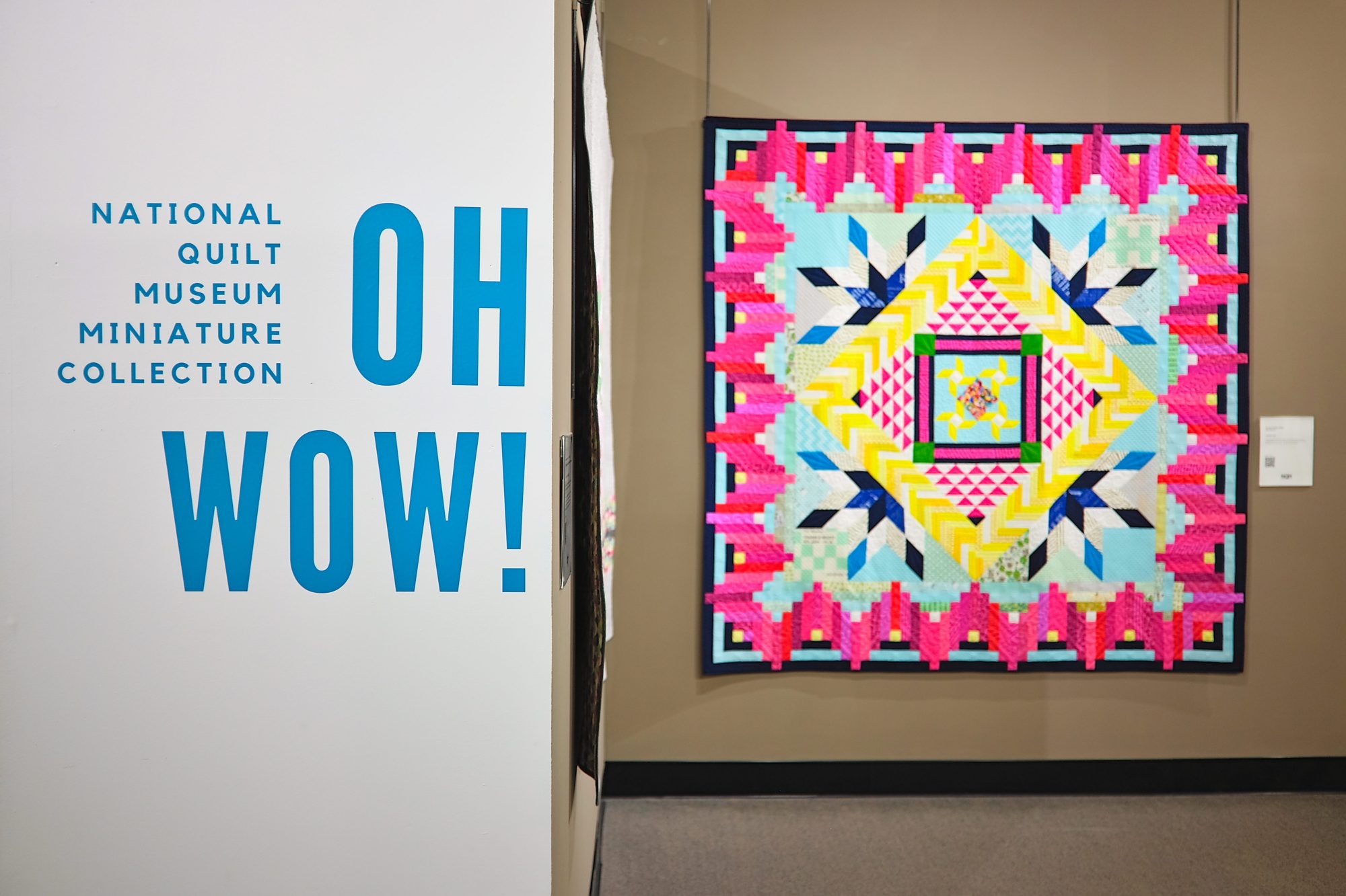 A sign that reads "Oh Wow!" at the National Quilt Museum
