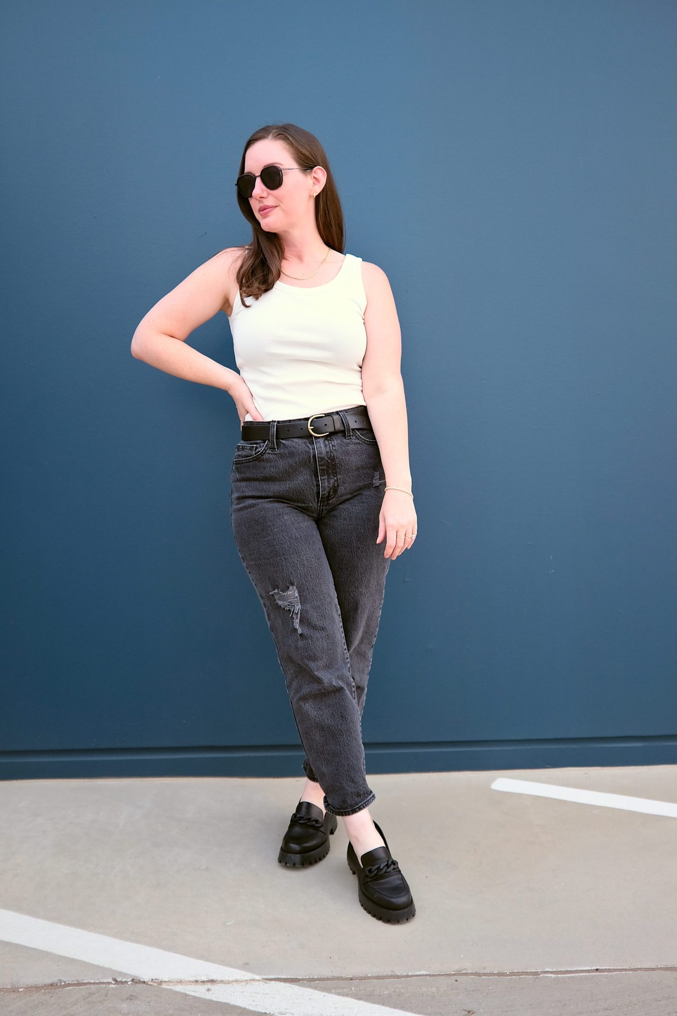 Alyssa wears the Roitfield Ribbed Tank with black jeans and loafers