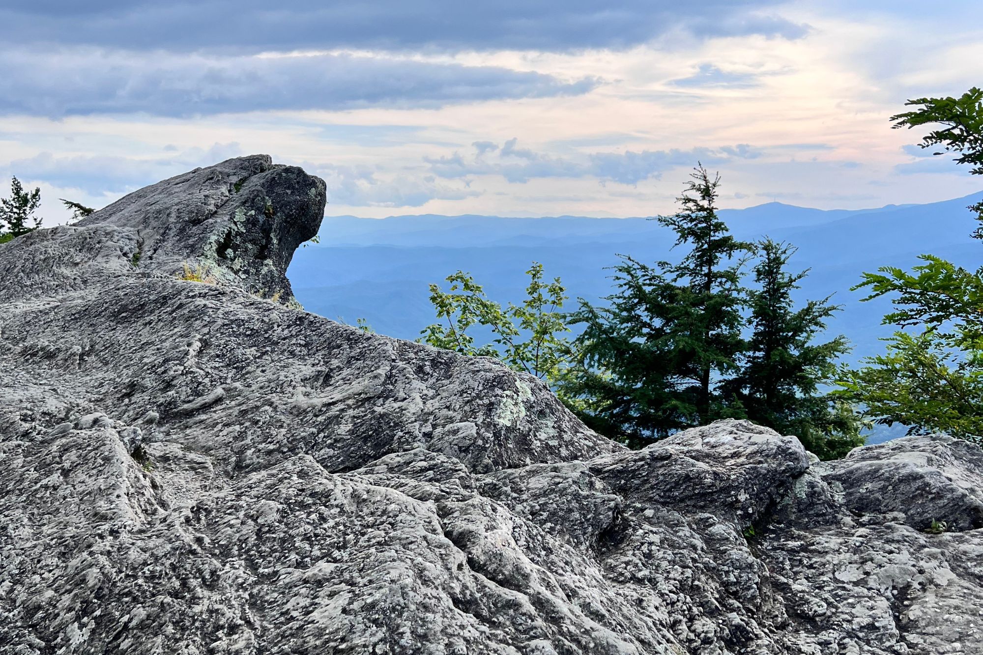 A photo of The Blowing Rock and the mountains in the background