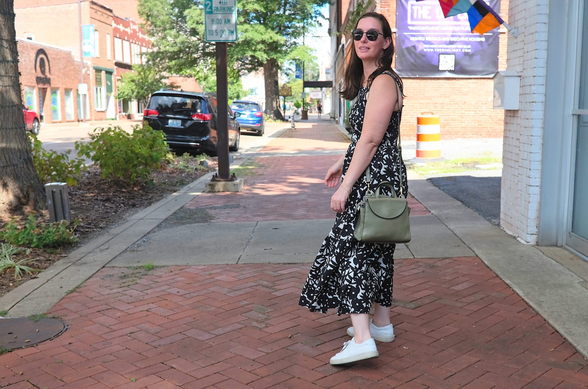 Alyssa walks down a street in Paducah