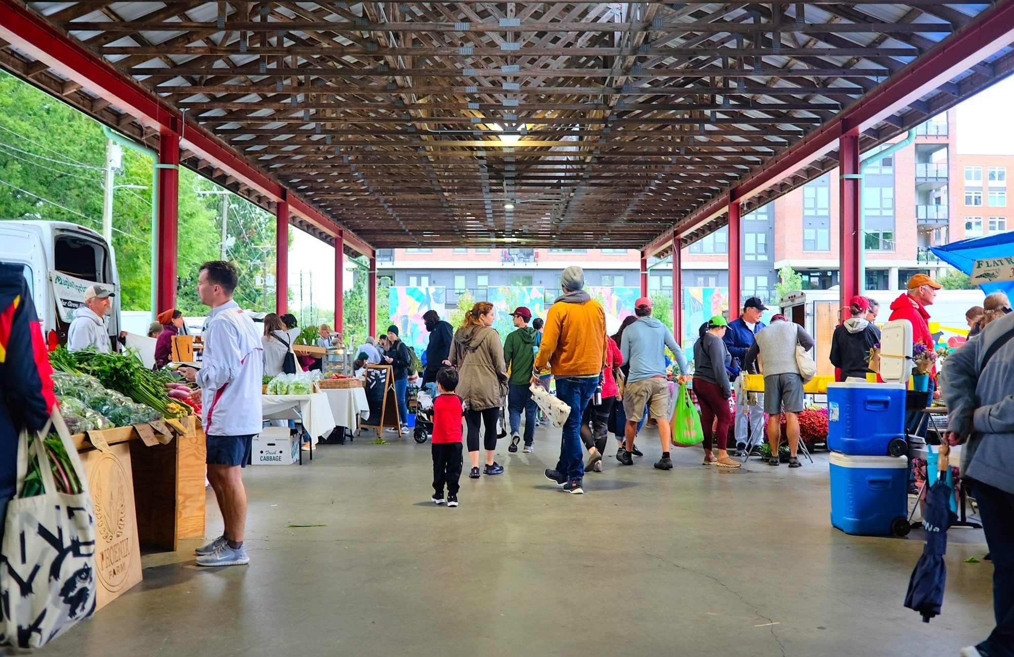Shoppers and vendors at the Durham Farmers Market