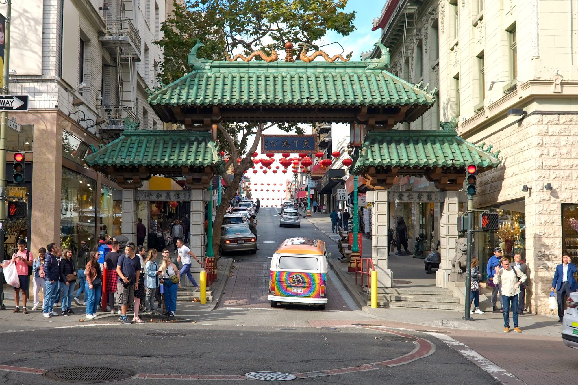 A crowd standing at the Dragon Gate