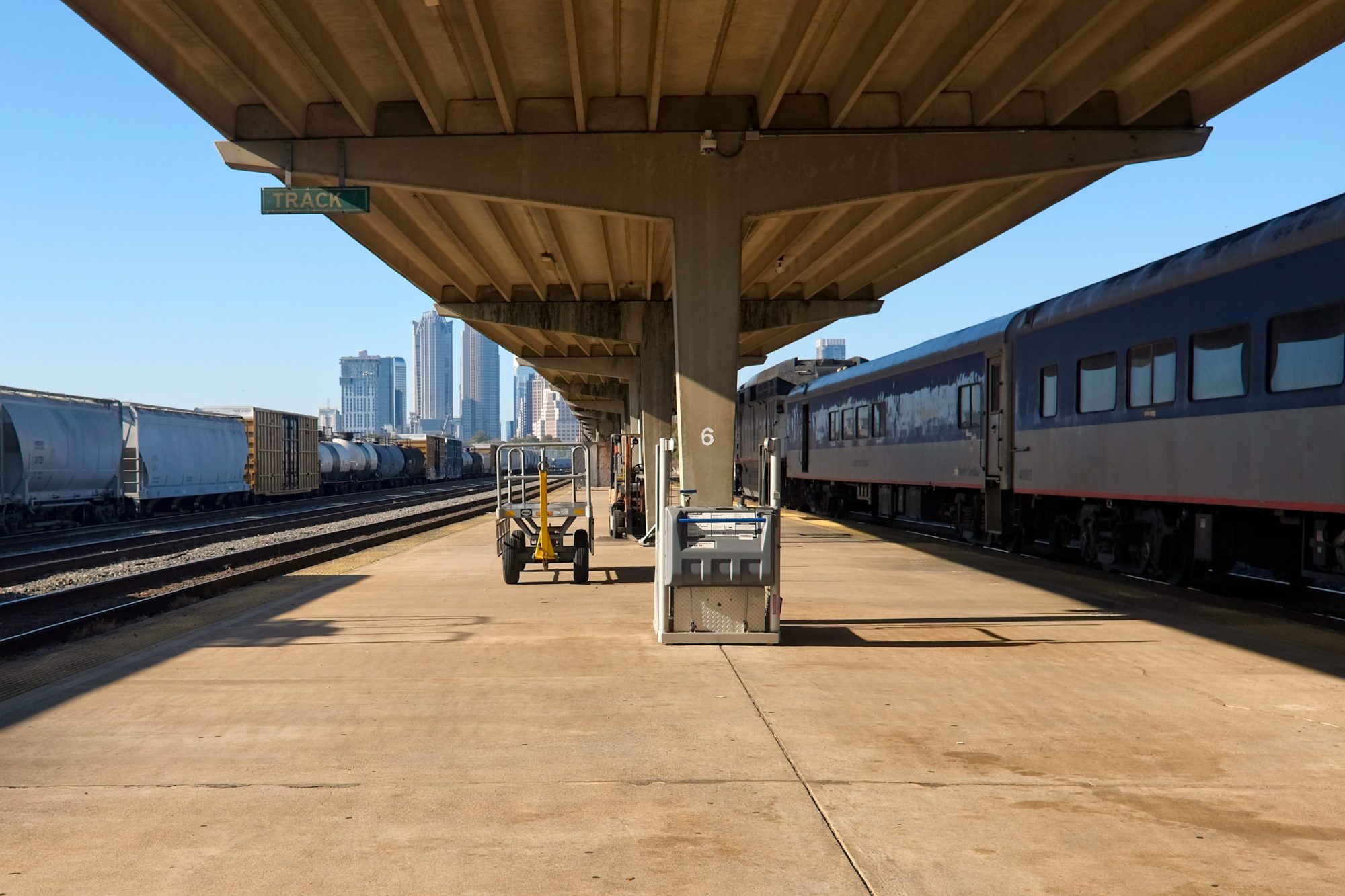 A photo of the Charlotte Amtrak Station with a Piedmont train on the tracks
