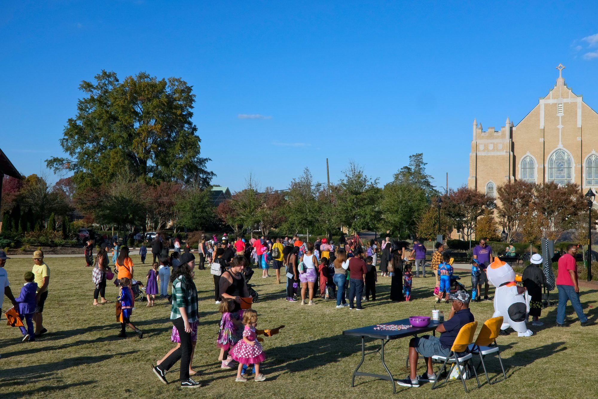 Groups of families attend a Halloween event in Salisbury