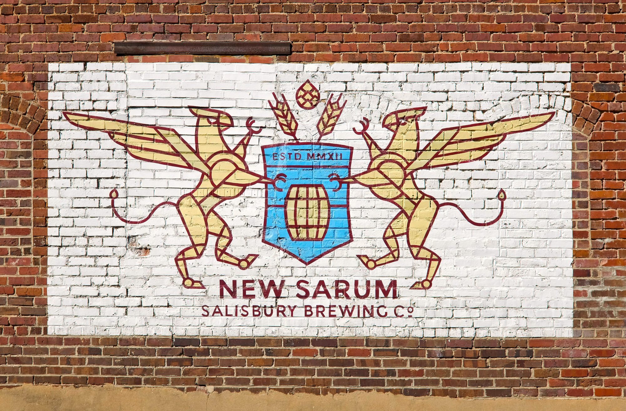 A mural that reads "New Sarum Salisbury Brewing"