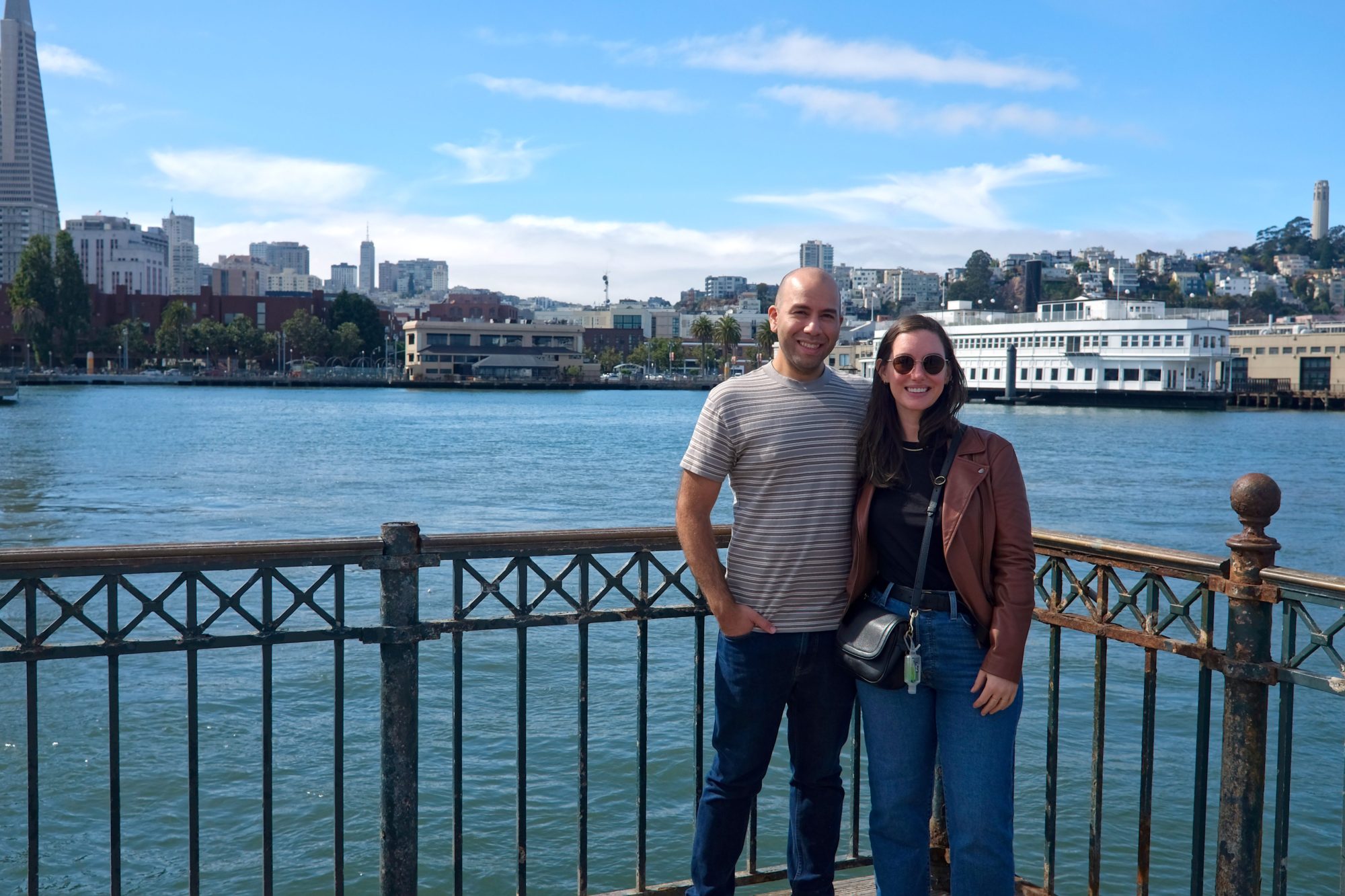 Alyssa and Michael take a photo with San Francisco in the background