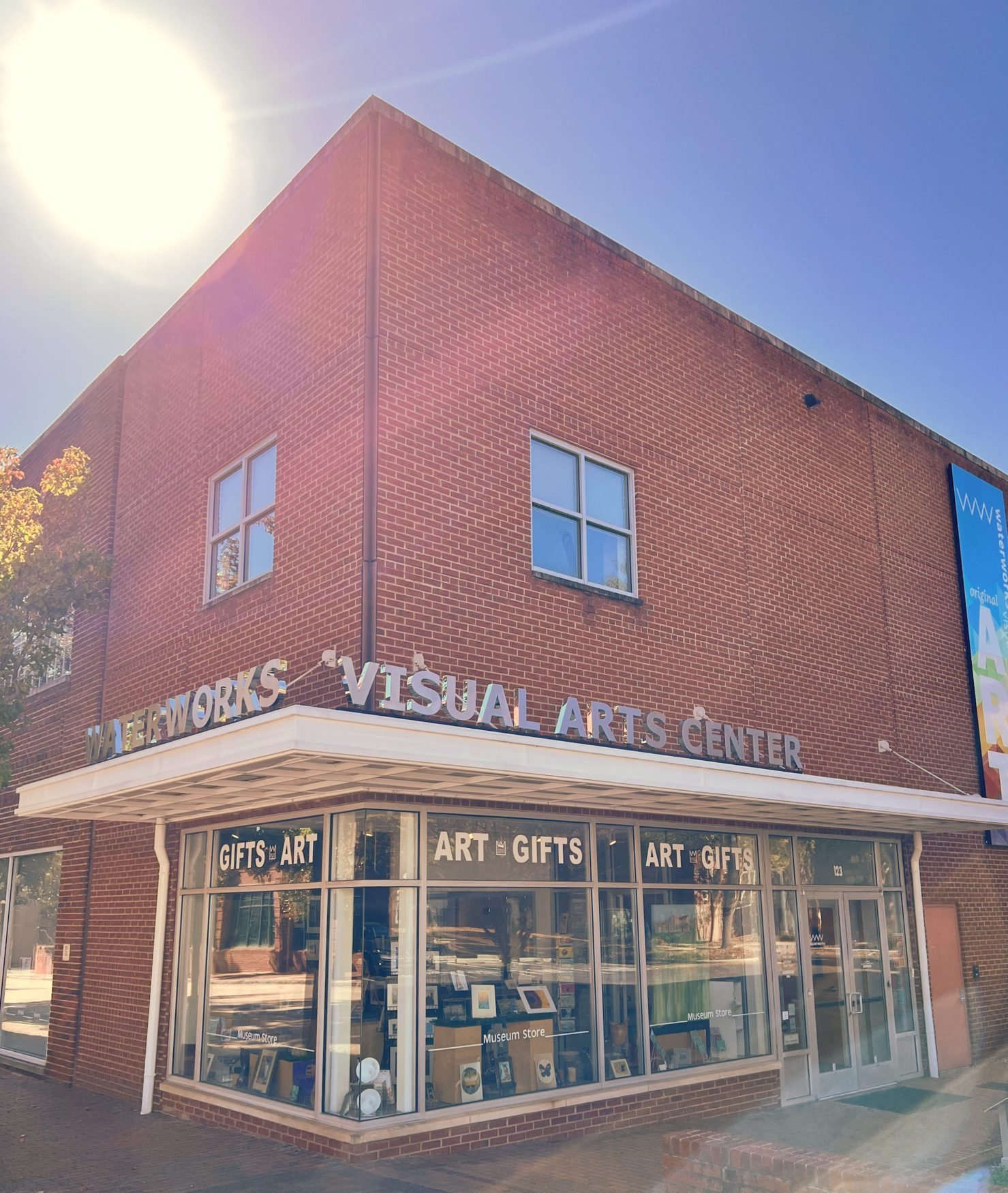 Exterior of a building with a sign that reads Waterworks Visual Arts Center