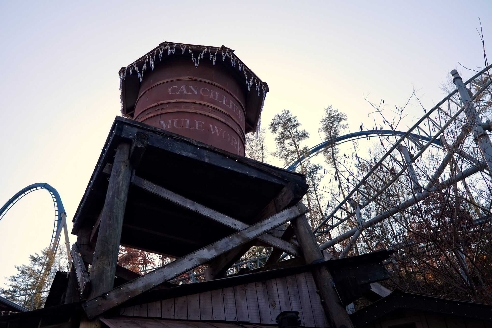 A water tower with Christmas lights